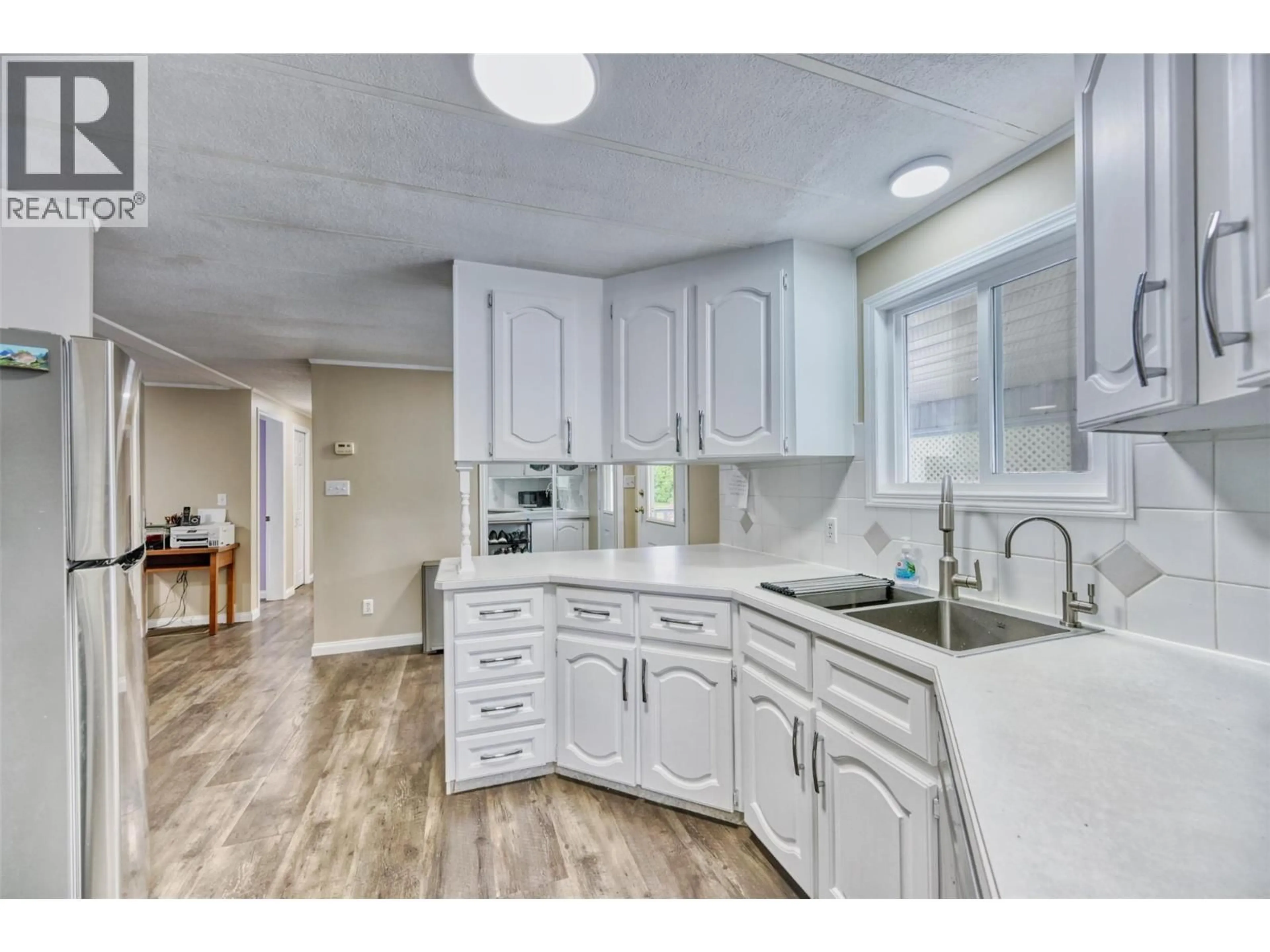 Open concept kitchen, ceramic/tile floor for 4911 CEDAR LANE LANE, Osoyoos British Columbia V0H1V3