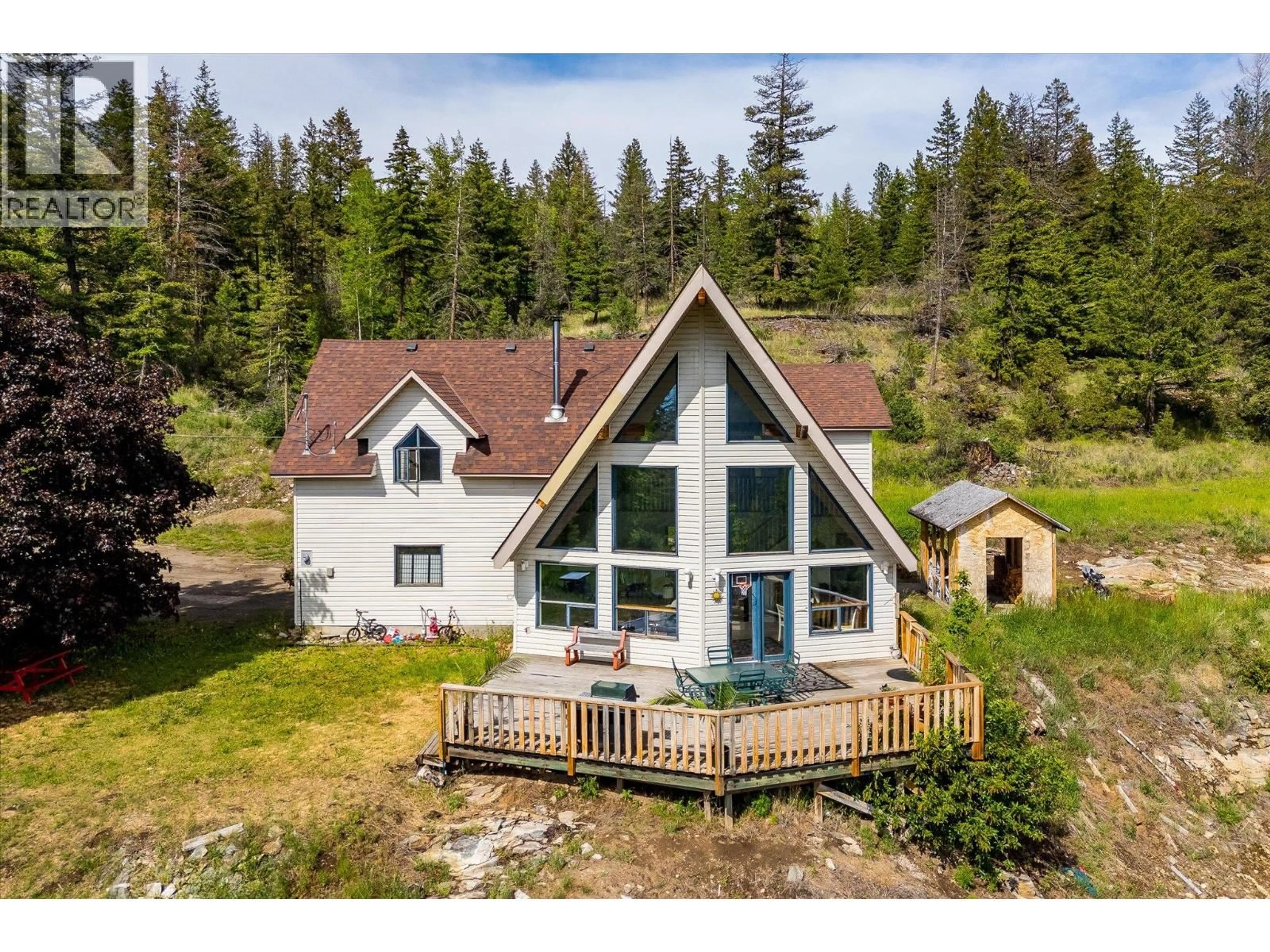 A pic from outside/outdoor area/front of a property/back of a property/a pic from drone, water/lake/river/ocean view for 1957 HUCKLEBERRY ROAD, Kelowna British Columbia V1X4K4