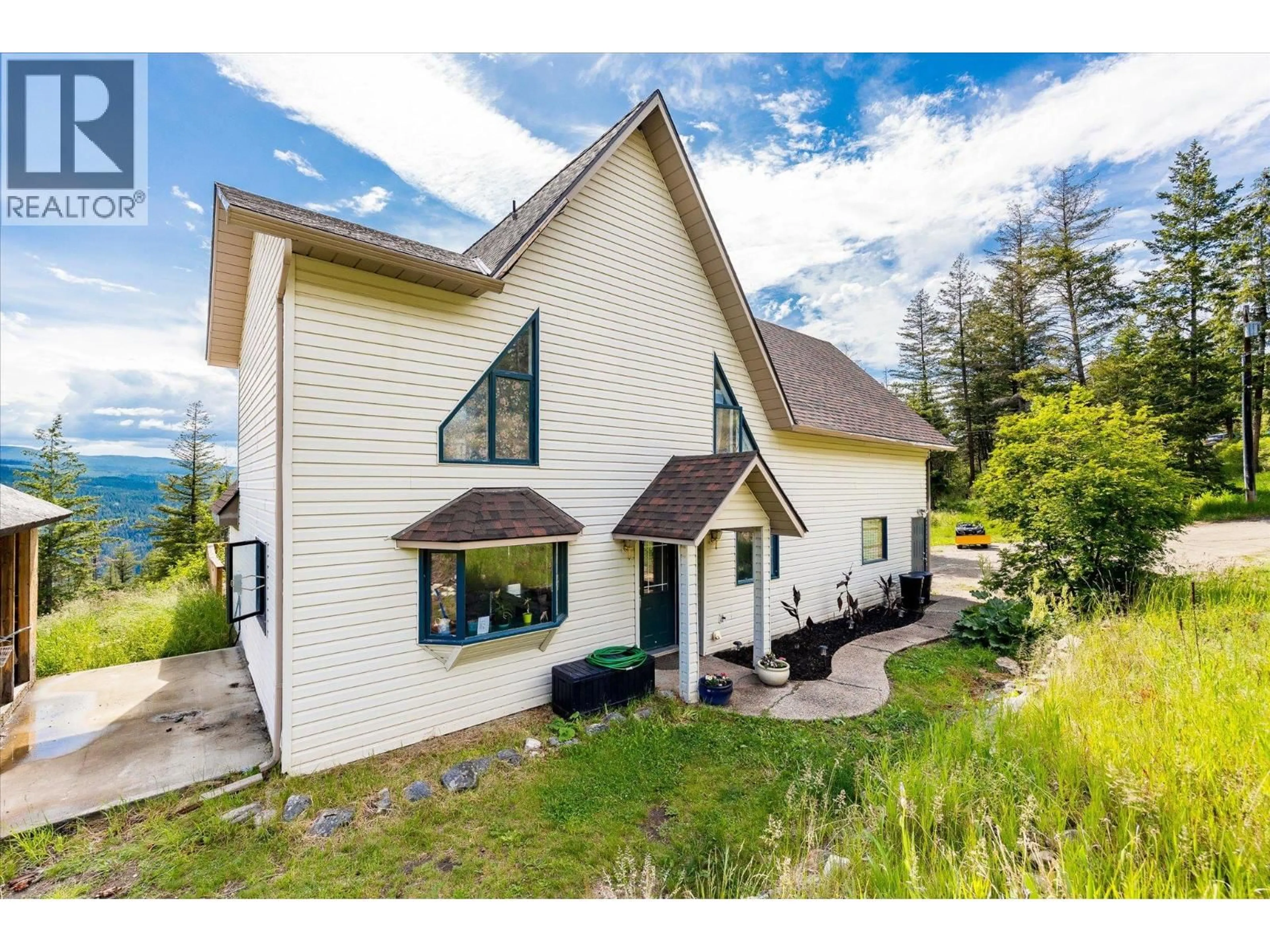 Home with vinyl exterior material, unknown for 1957 HUCKLEBERRY ROAD, Kelowna British Columbia V1X4K4