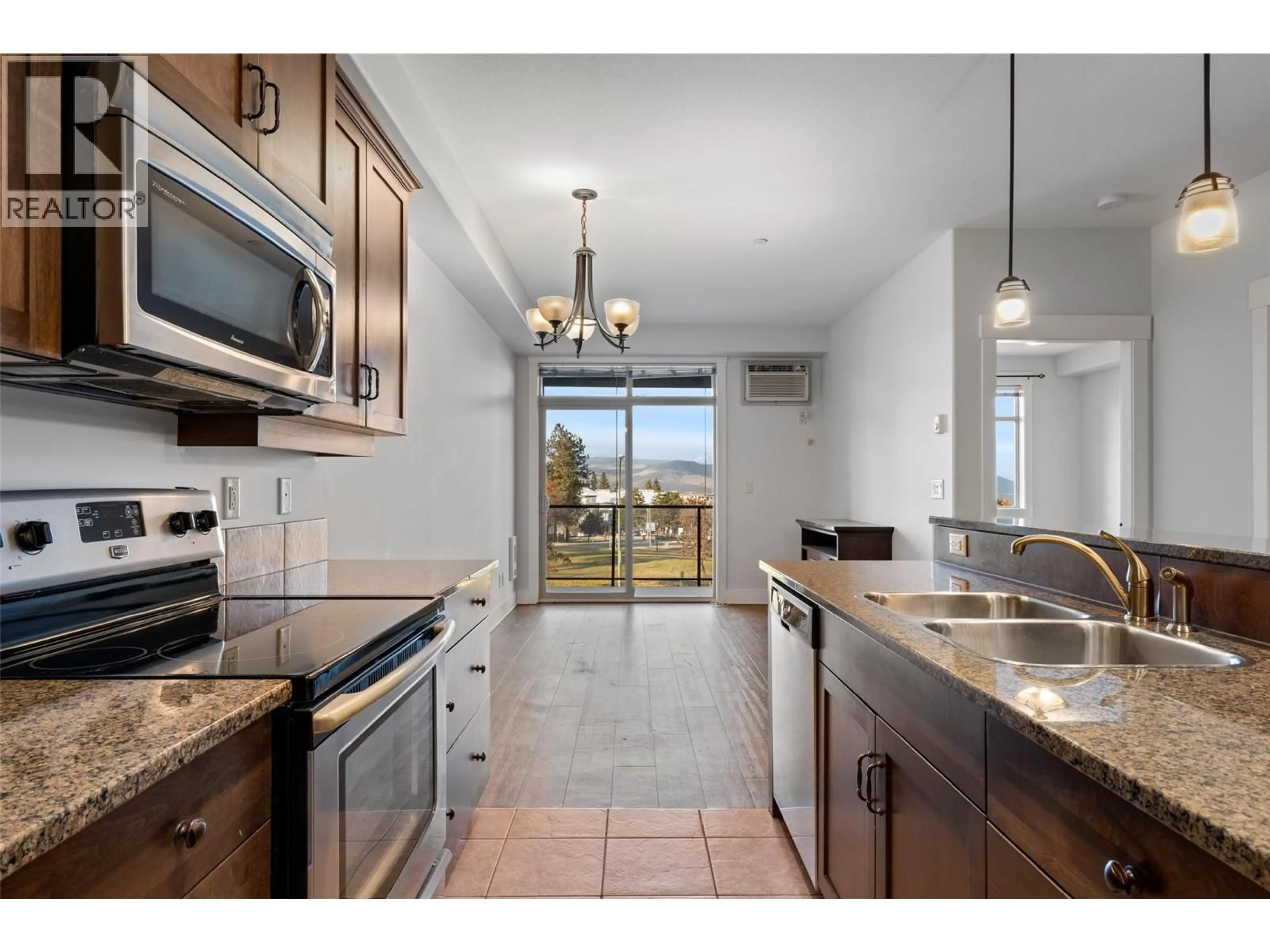 Open concept kitchen, ceramic/tile floor for 202 - 775 MCGILL ROAD, Kamloops British Columbia V2C0B8