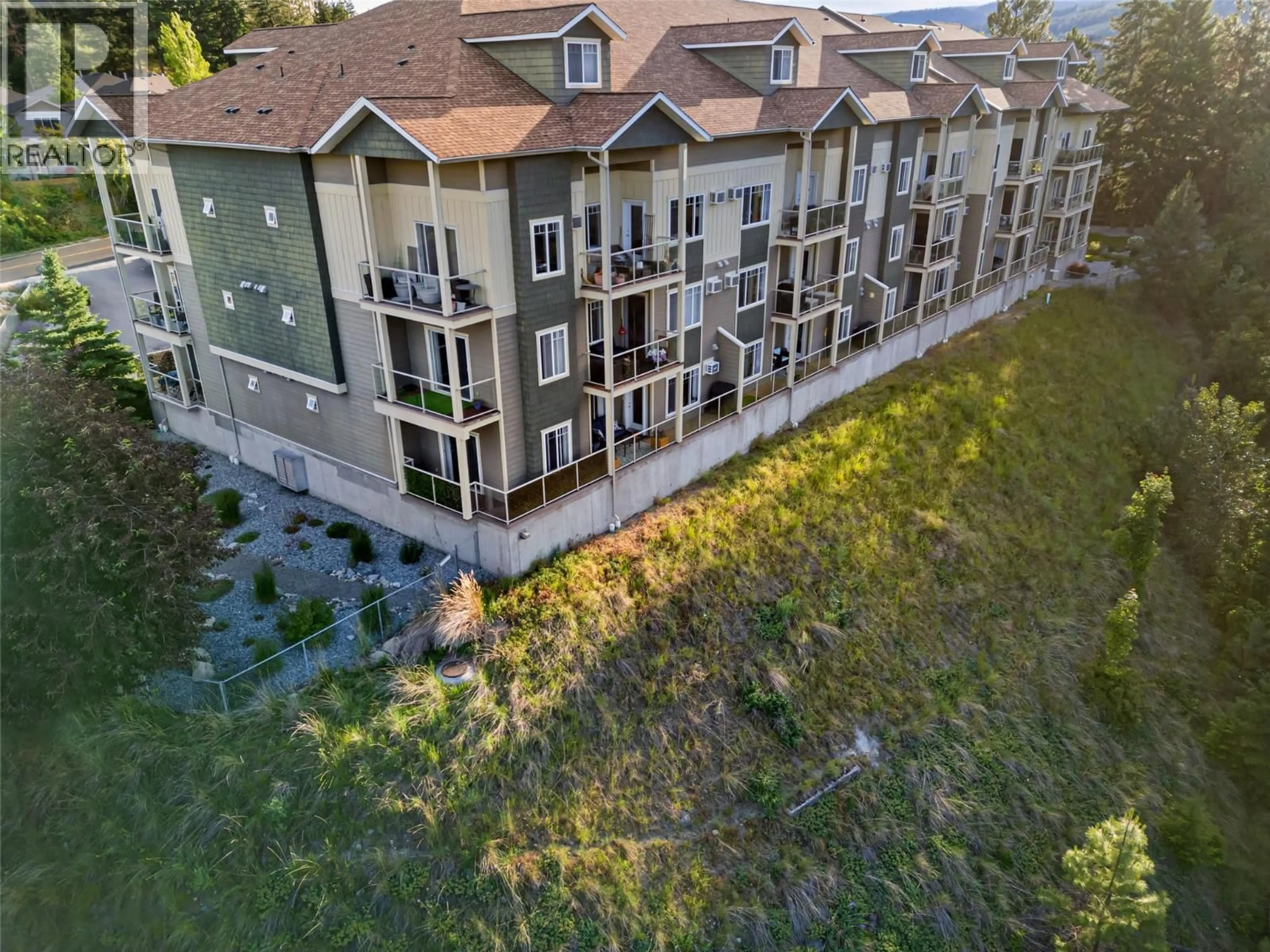 A pic from outside/outdoor area/front of a property/back of a property/a pic from drone, city buildings view from balcony for 110 - 2120 SHANNON RIDGE DRIVE, West Kelowna British Columbia V4T2Z3