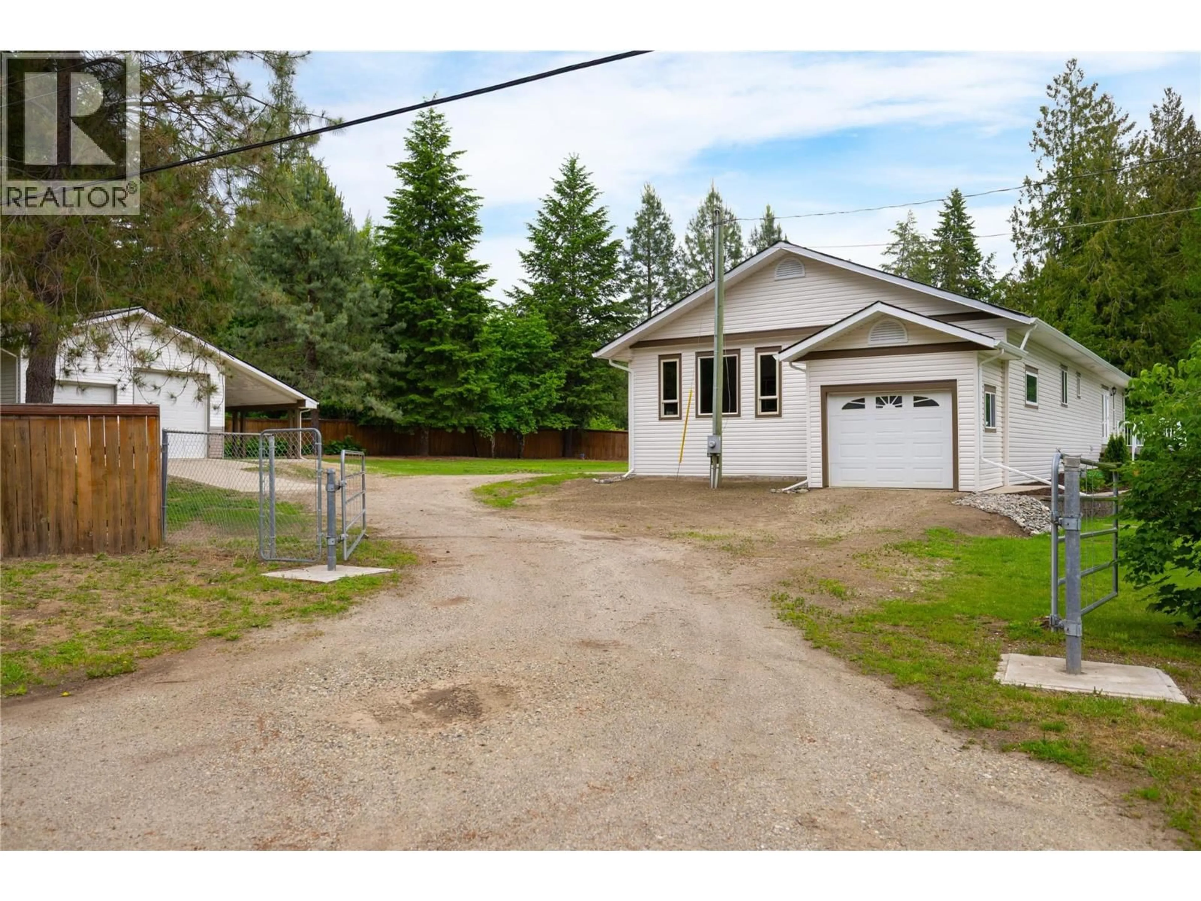A pic from outside/outdoor area/front of a property/back of a property/a pic from drone, street for 637 ENDERBY MABEL LAKE ROAD, Enderby British Columbia V0E1V4