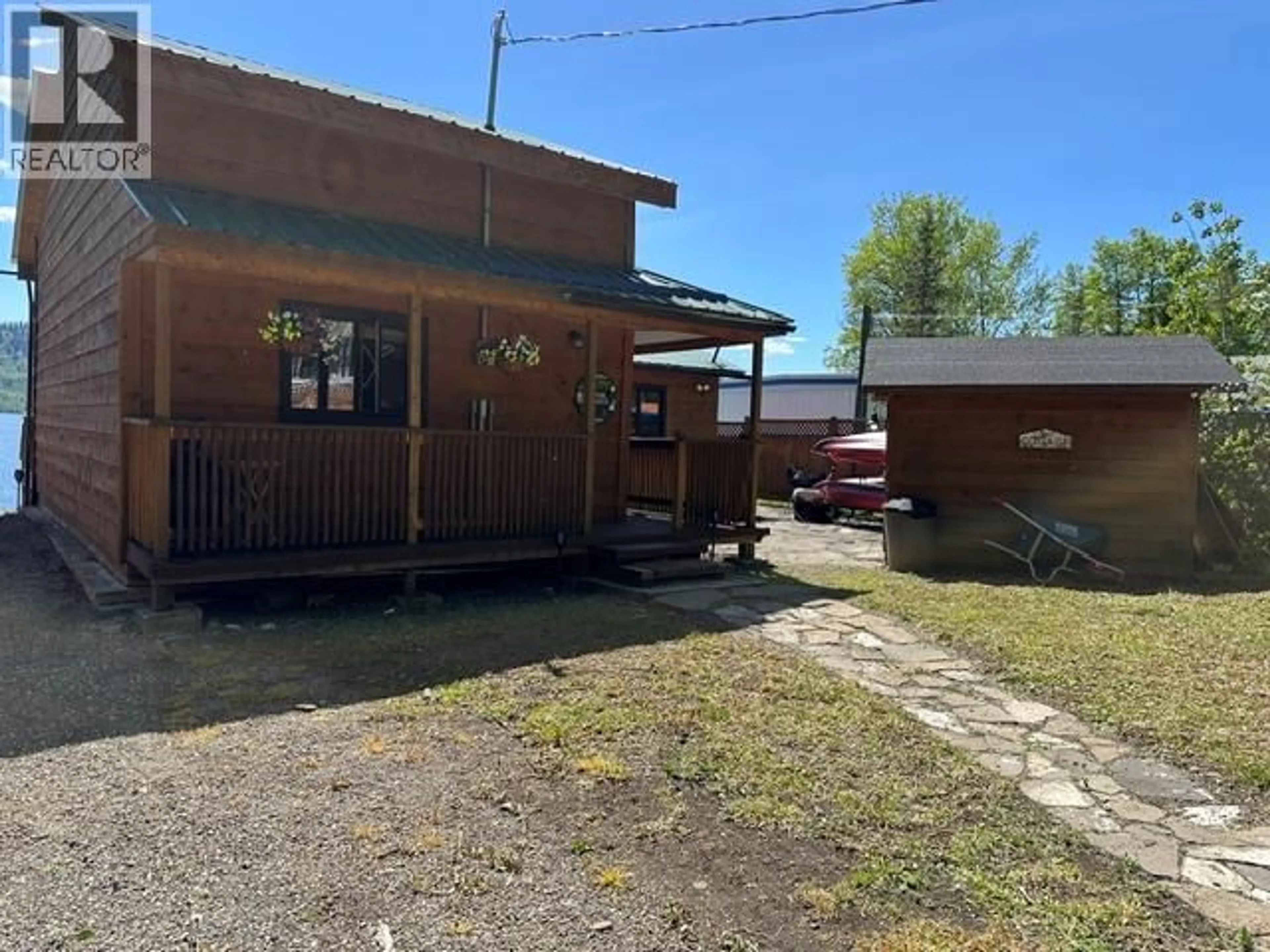 A pic from outside/outdoor area/front of a property/back of a property/a pic from drone, building for 6597 HOLIDAY BEACH, Moberly Lake British Columbia V0C1X0