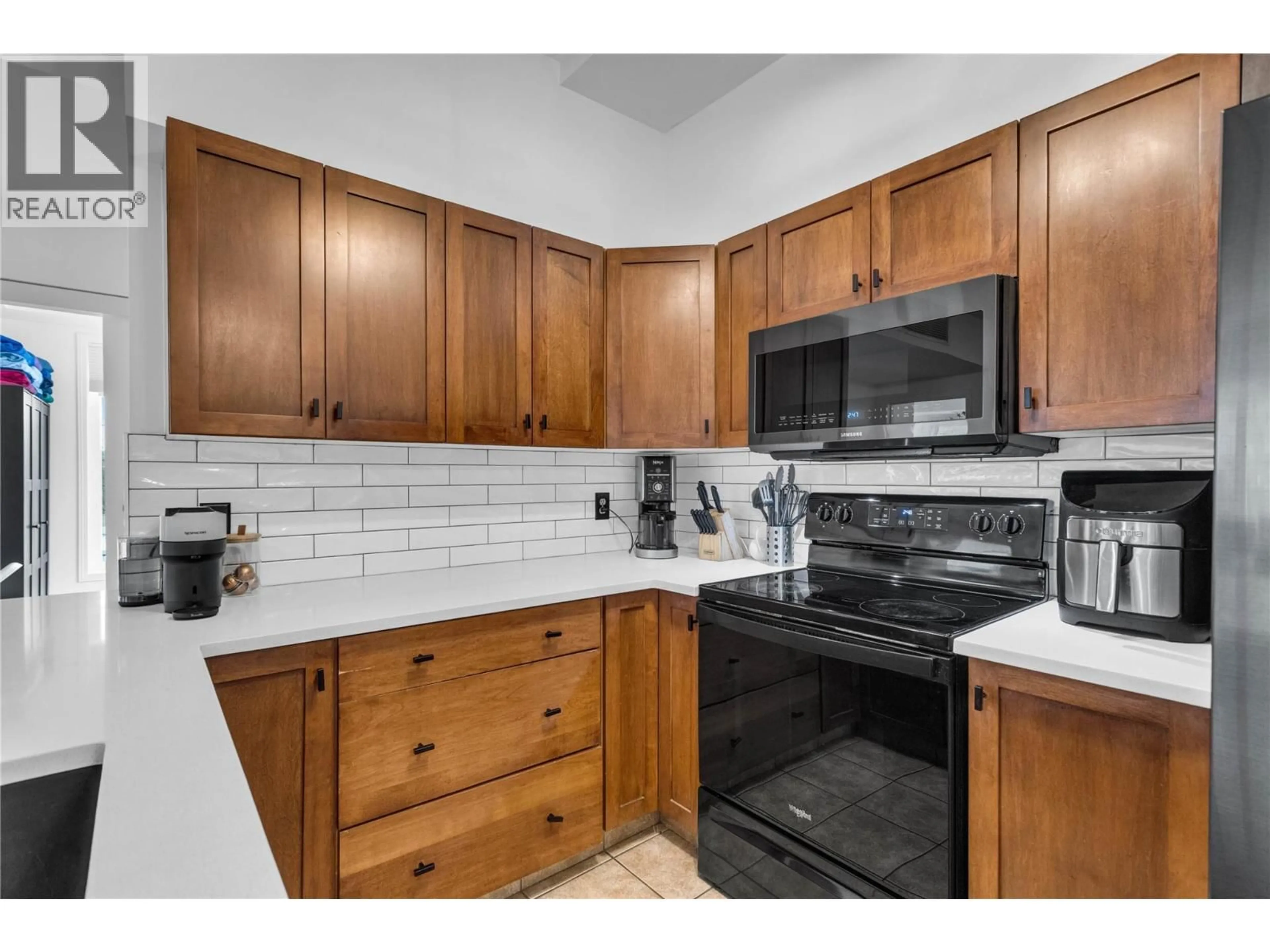 Standard kitchen, ceramic/tile floor for 1407 - 3168 VIA CENTRALE ROAD, Kelowna British Columbia V1V2R6