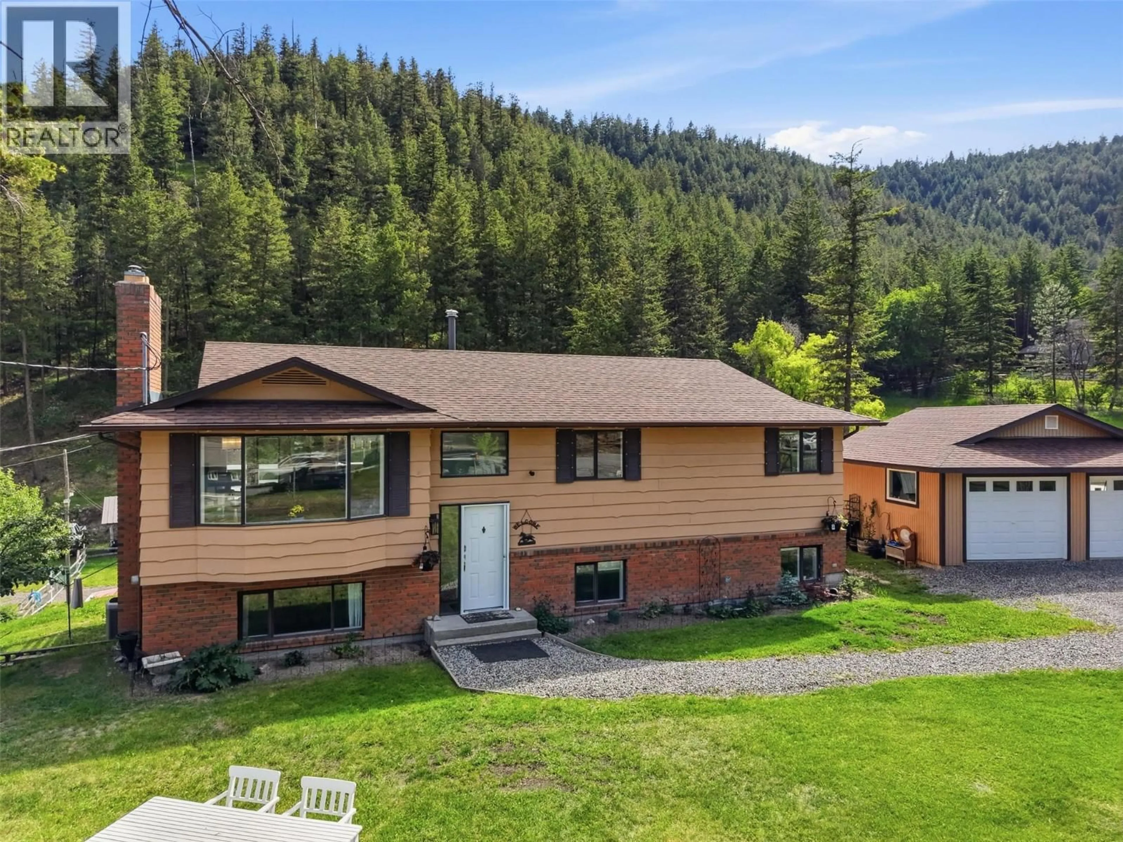 A pic from outside/outdoor area/front of a property/back of a property/a pic from drone, mountain view for 2015 PRATT ROAD, Kamloops British Columbia V2C5Z7