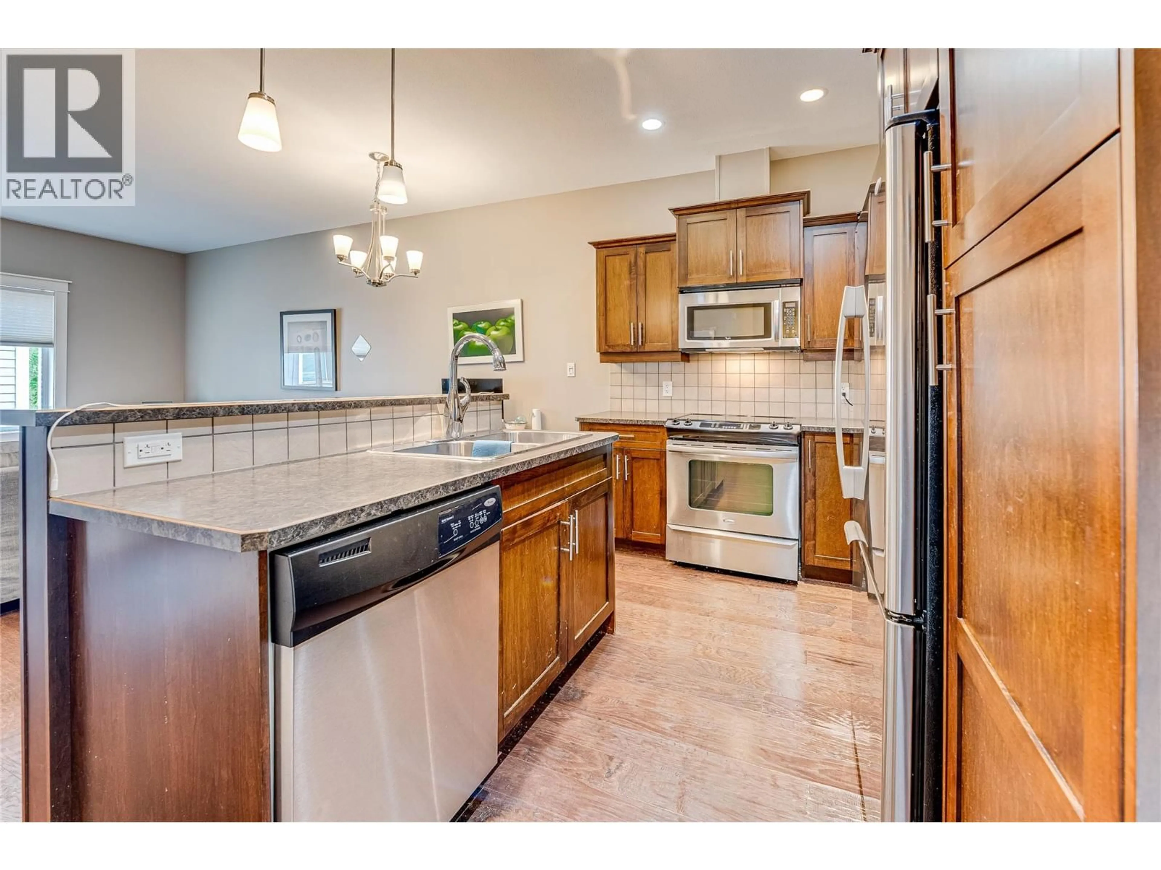 Open concept kitchen, ceramic/tile floor for 104 - 3606 25 AVENUE, Vernon British Columbia V1T1P3