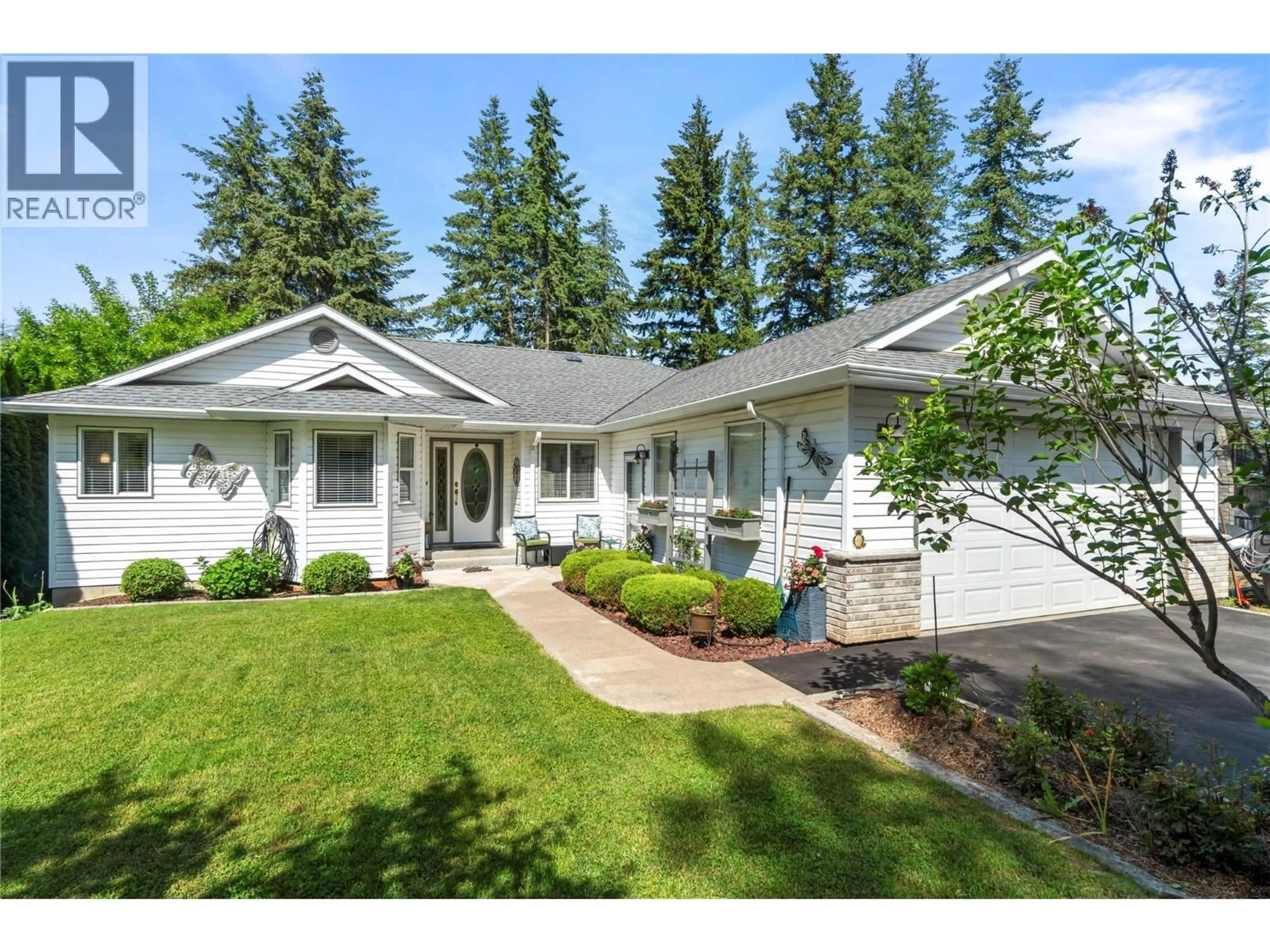 Home with vinyl exterior material, street for 2215 LAKEVIEW DRIVE, Blind Bay British Columbia V0E2W2