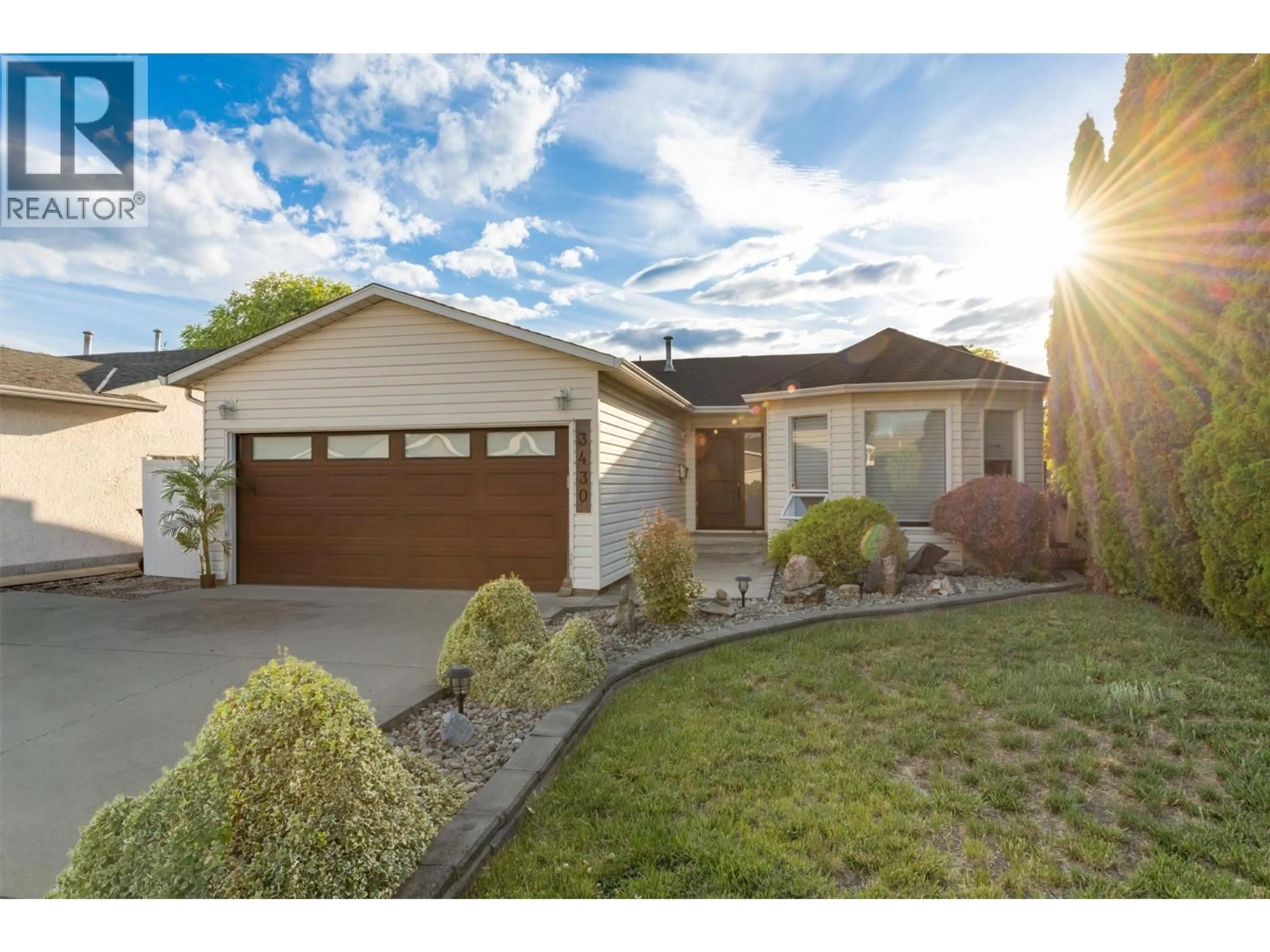 Home with vinyl exterior material, street for 3430 SILVERBERRY ROAD, Kelowna British Columbia V1W3V5