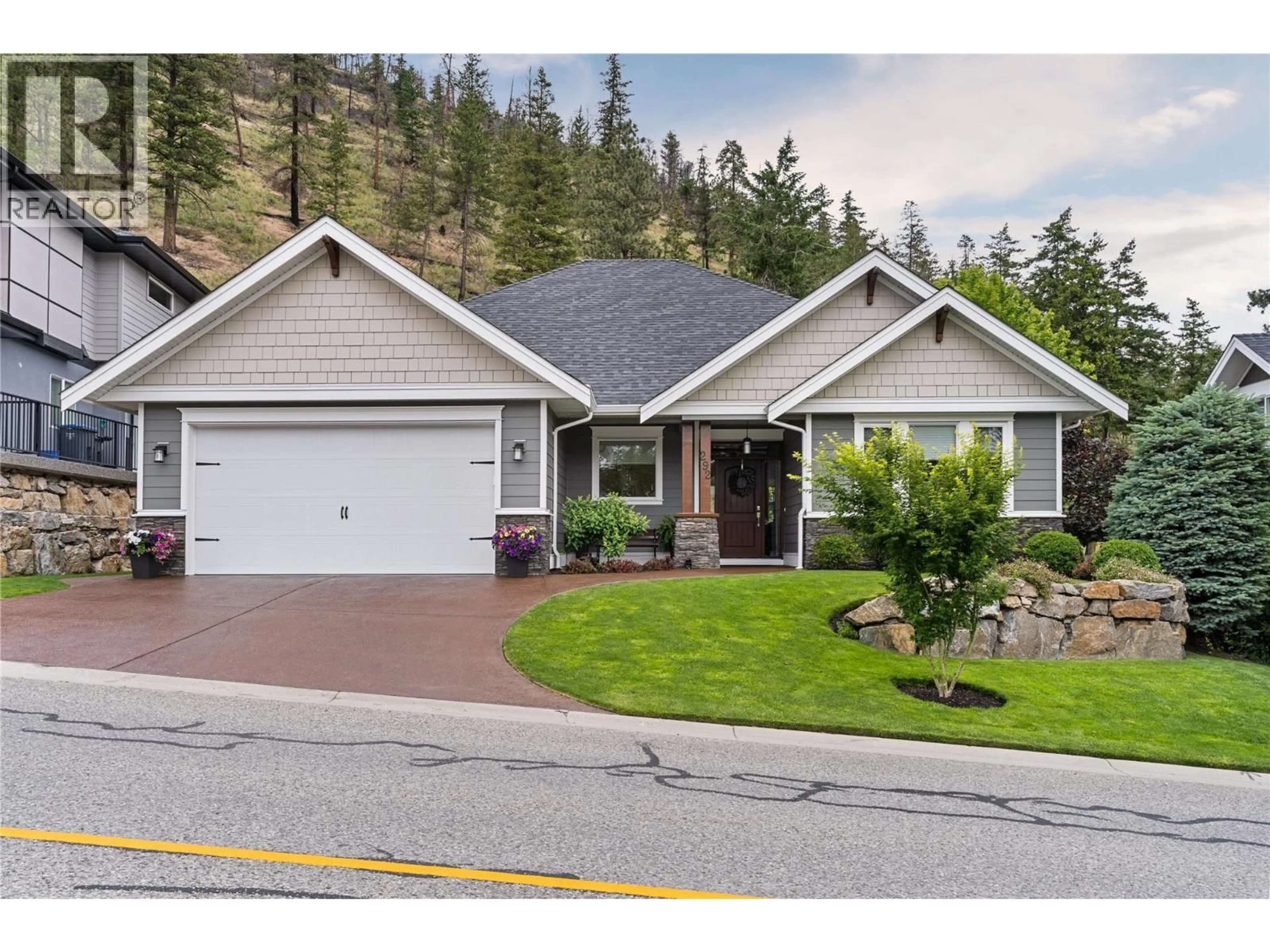 Home with vinyl exterior material, street for 292 UPPER CANYON DRIVE NORTH, Kelowna British Columbia V1V3C7
