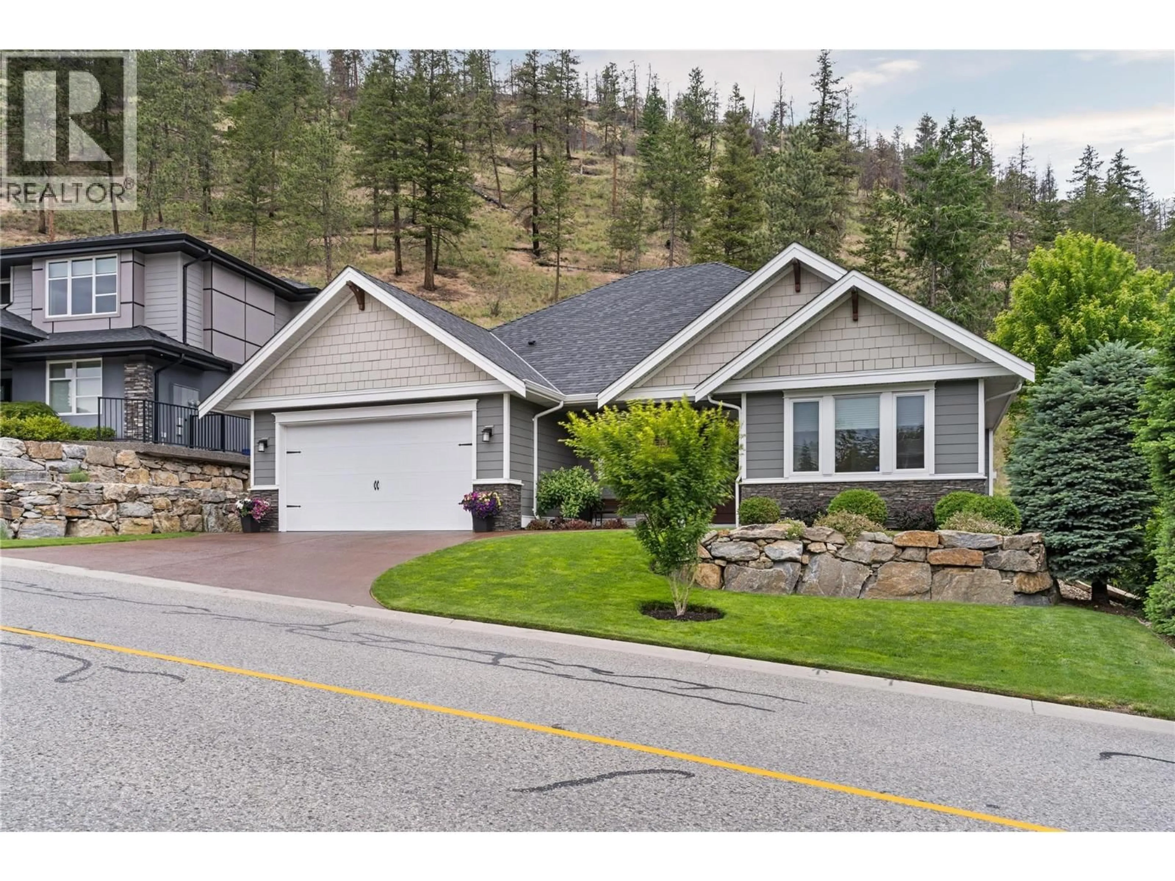 Home with vinyl exterior material, street for 292 UPPER CANYON DRIVE NORTH, Kelowna British Columbia V1V3C7