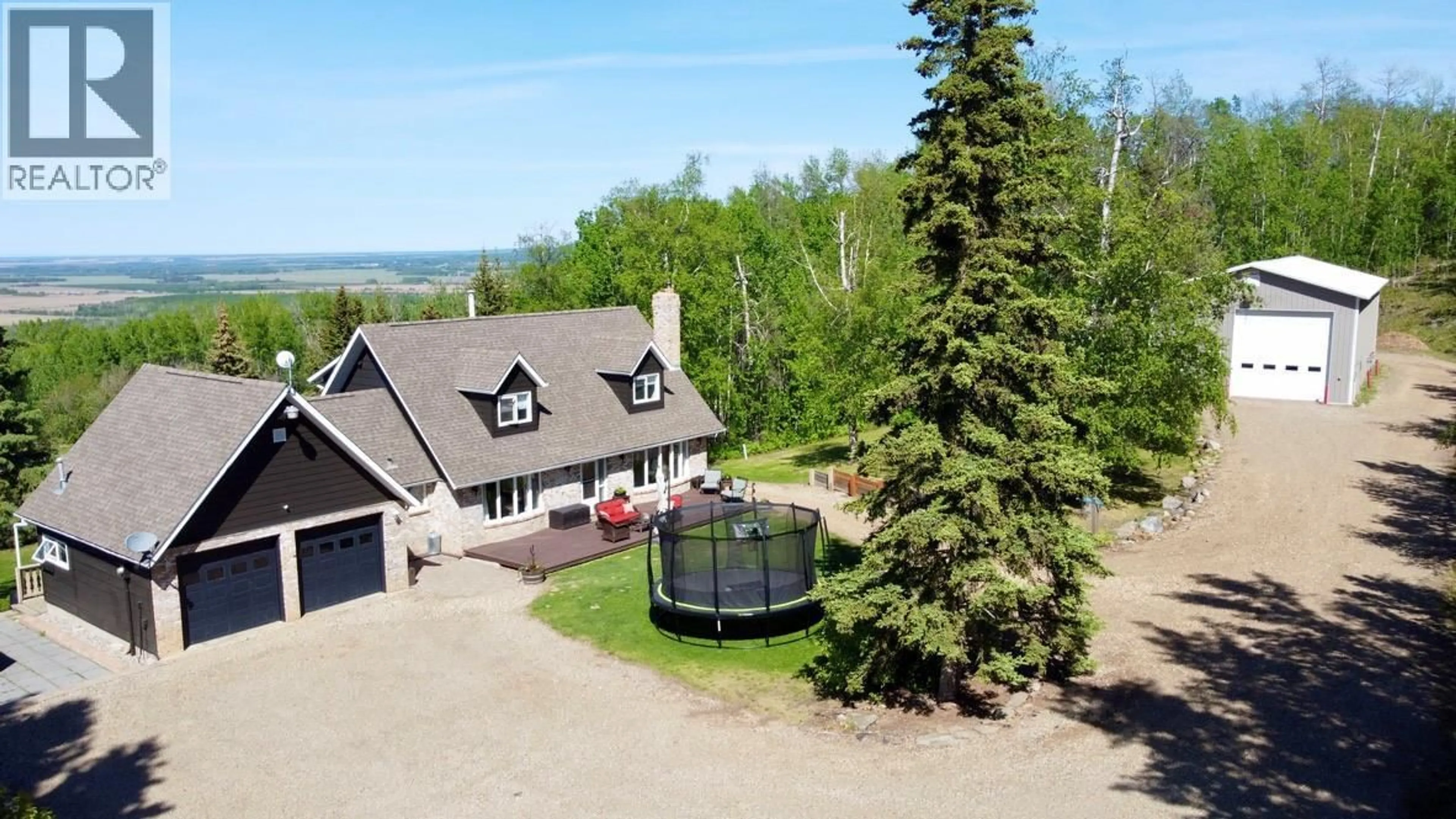 A pic from outside/outdoor area/front of a property/back of a property/a pic from drone, unknown for 158 MOORE OTHER, Dawson Creek British Columbia V1G4E8