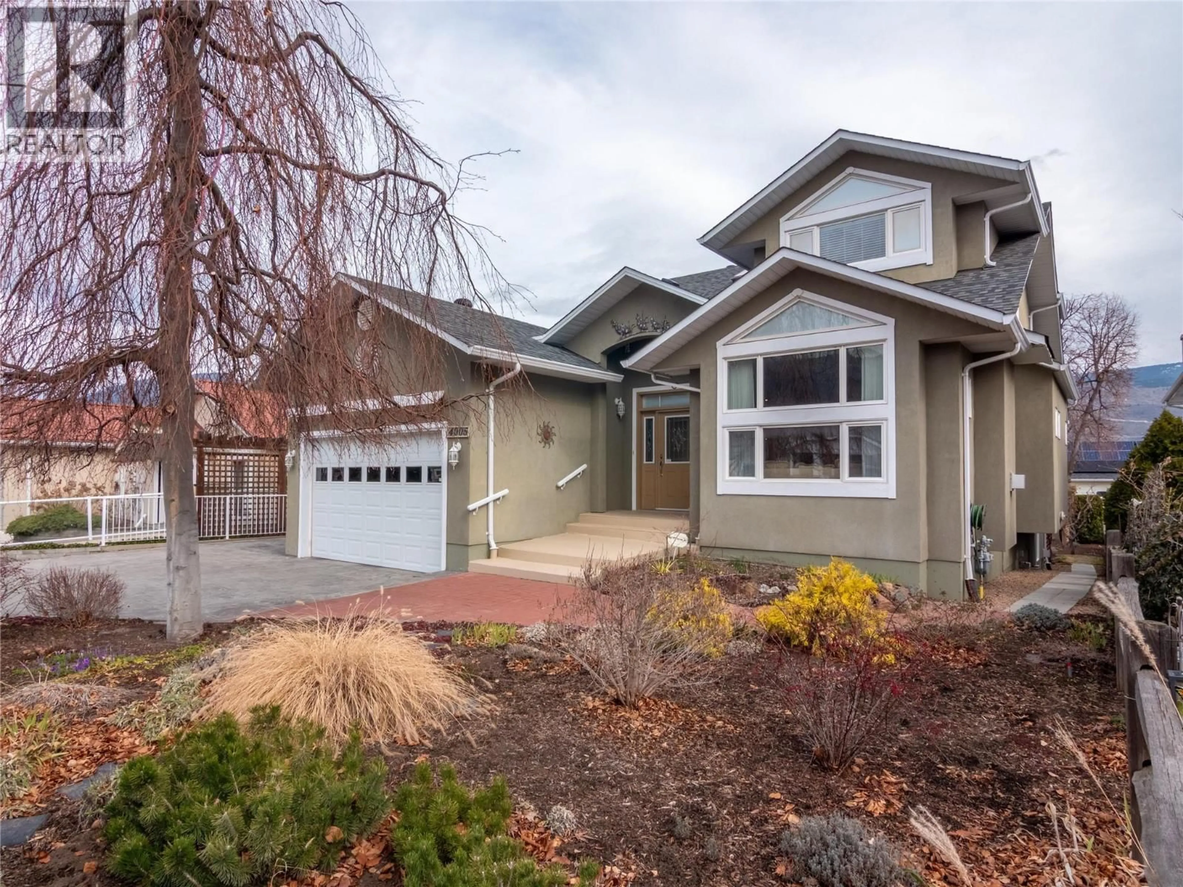 Home with vinyl exterior material, street for 4005 LOBELIA DRIVE, Osoyoos British Columbia V0H1V1