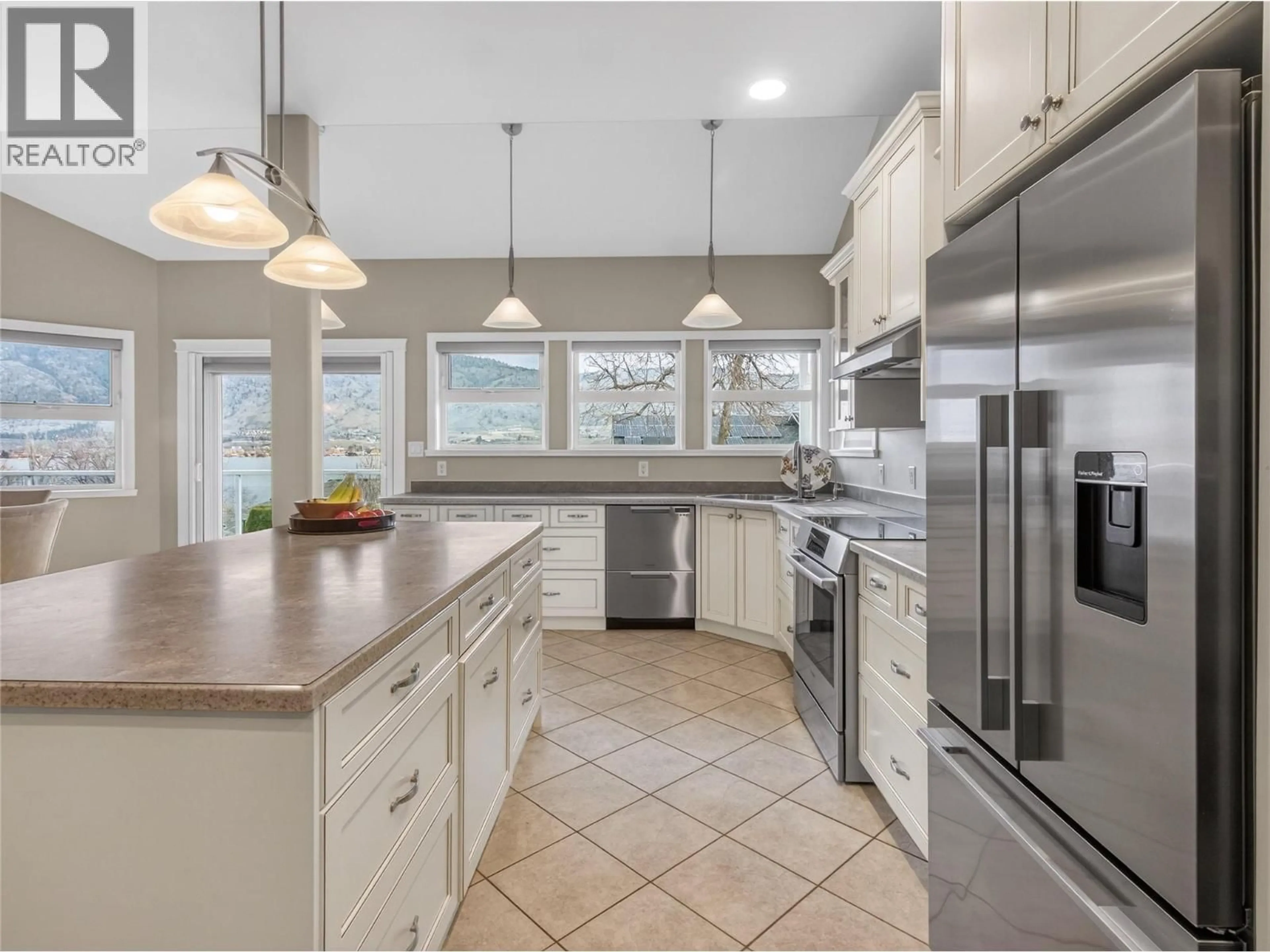 Open concept kitchen, ceramic/tile floor for 4005 LOBELIA DRIVE, Osoyoos British Columbia V0H1V1
