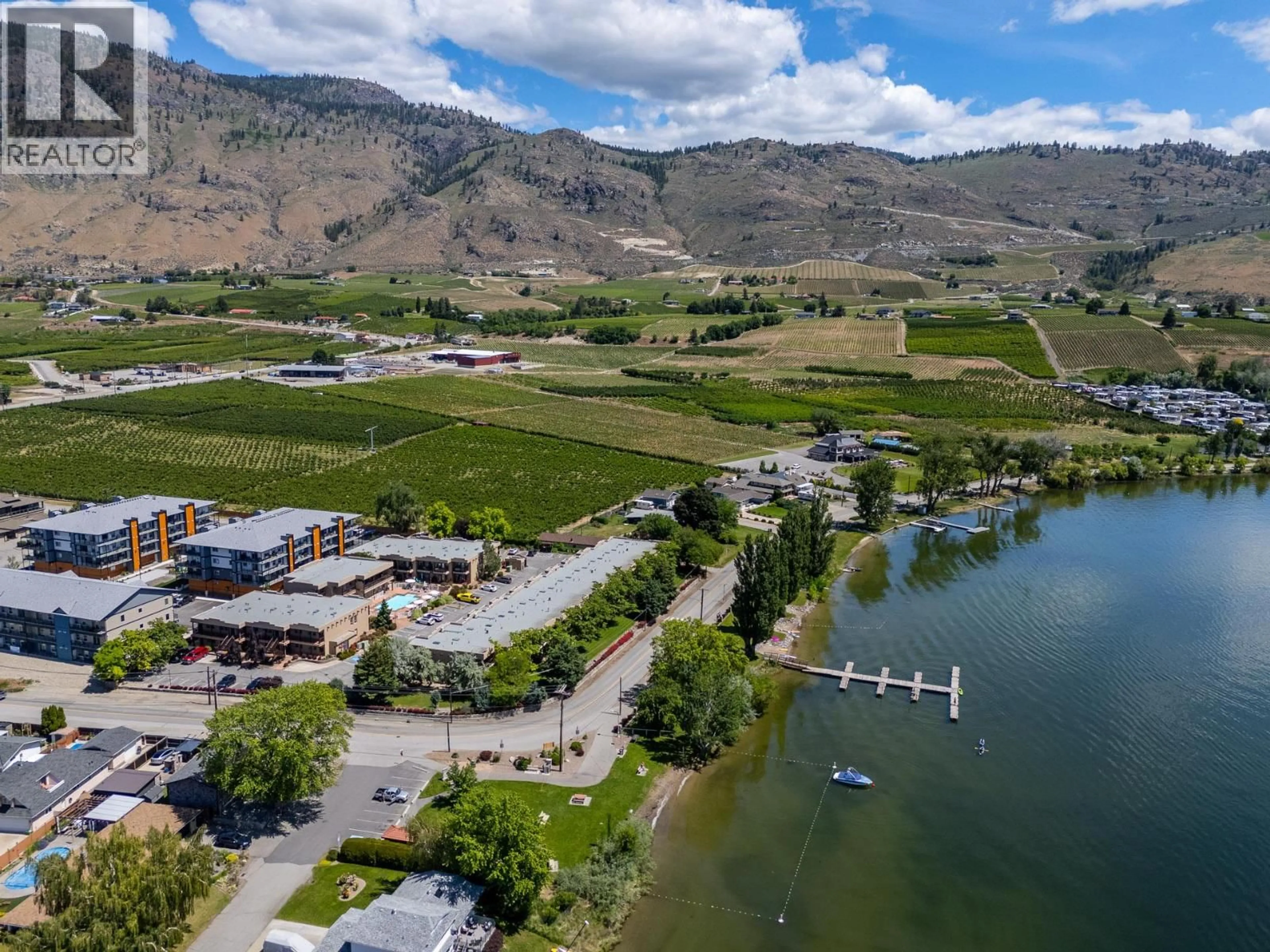 A pic from outside/outdoor area/front of a property/back of a property/a pic from drone, water/lake/river/ocean view for 122 - 5401 LAKESHORE DRIVE, Osoyoos British Columbia V0H1V6