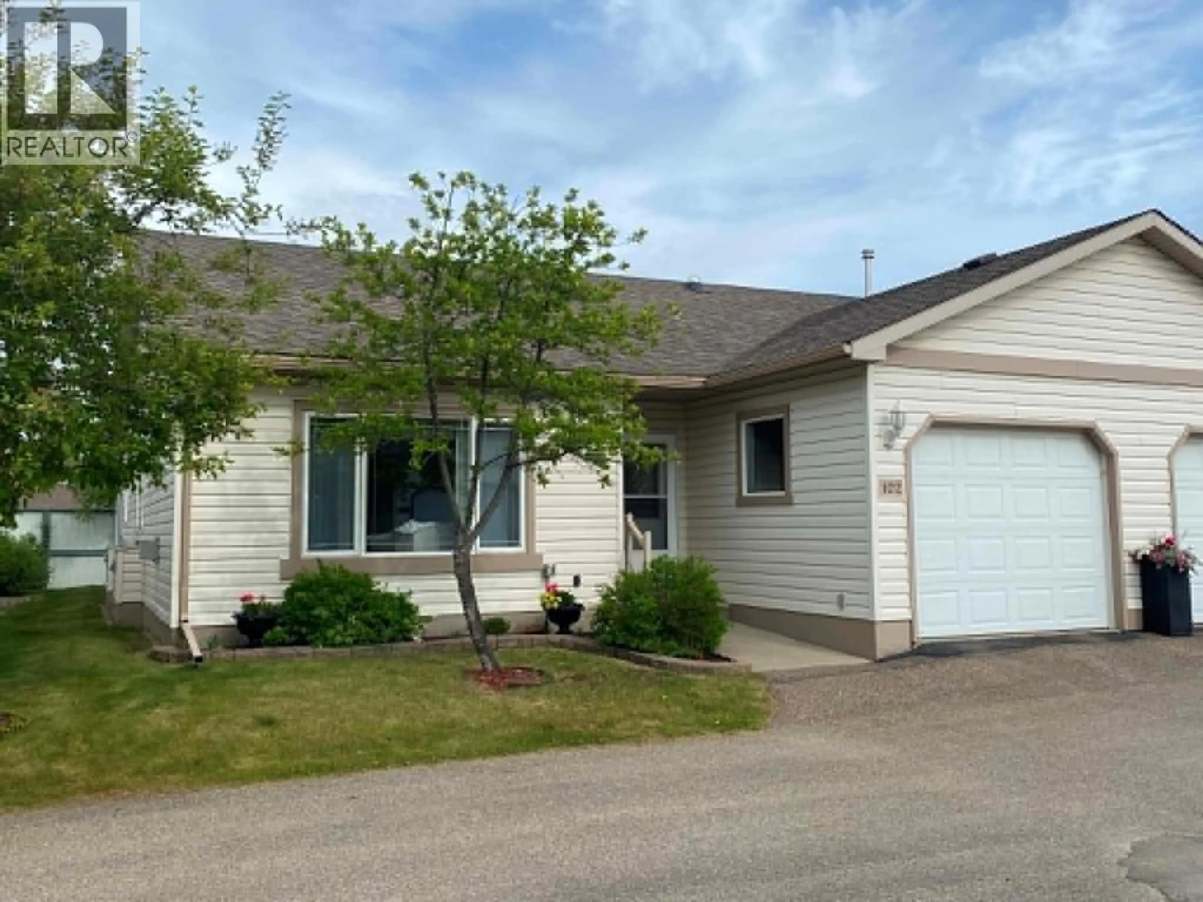 Home with vinyl exterior material, street for 102 - 1708 108 AVENUE, Dawson Creek British Columbia V1G2T7
