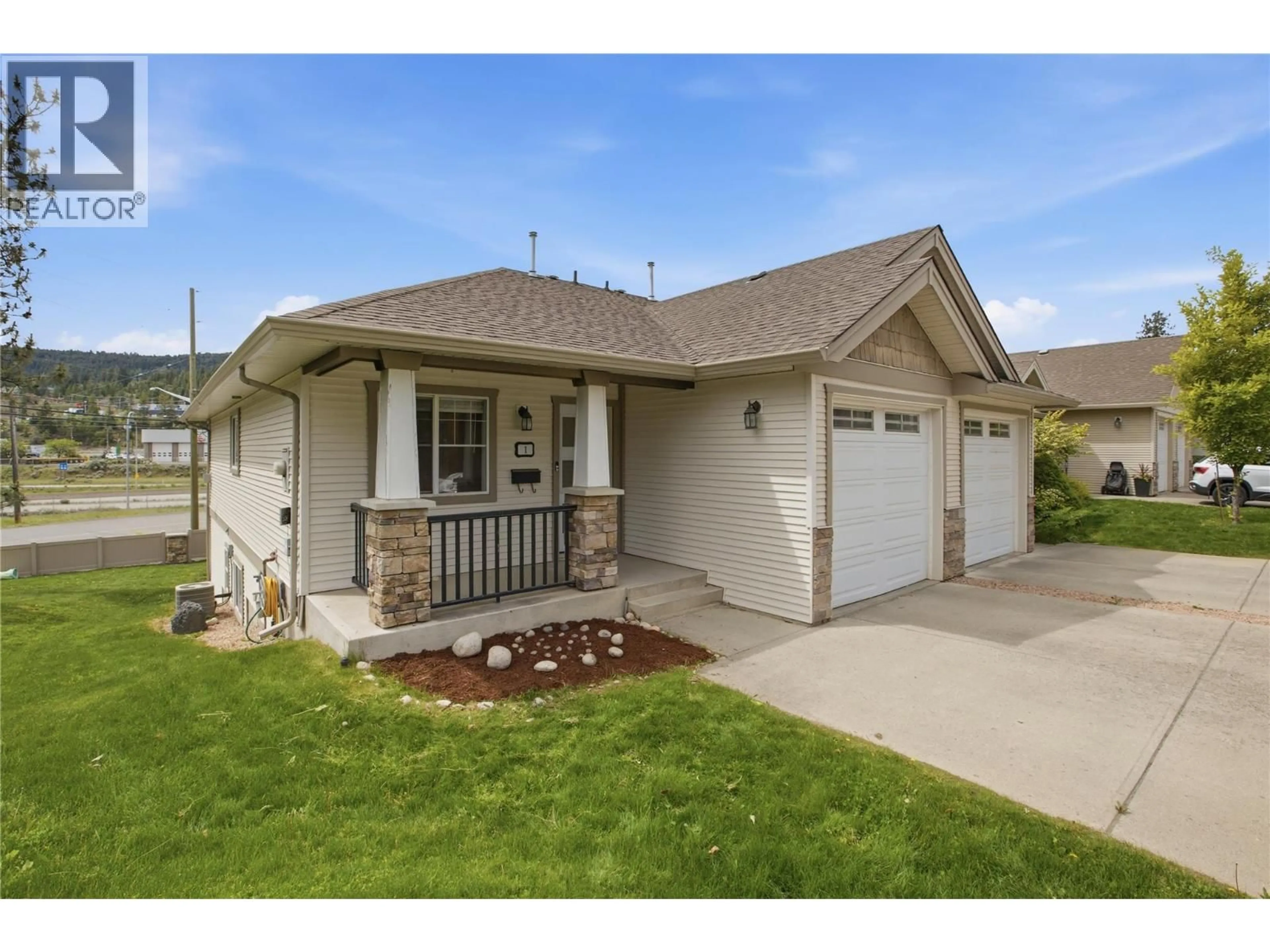 Home with vinyl exterior material, street for 1 - 1940 HILLSIDE DRIVE, Kamloops British Columbia V2E2T3