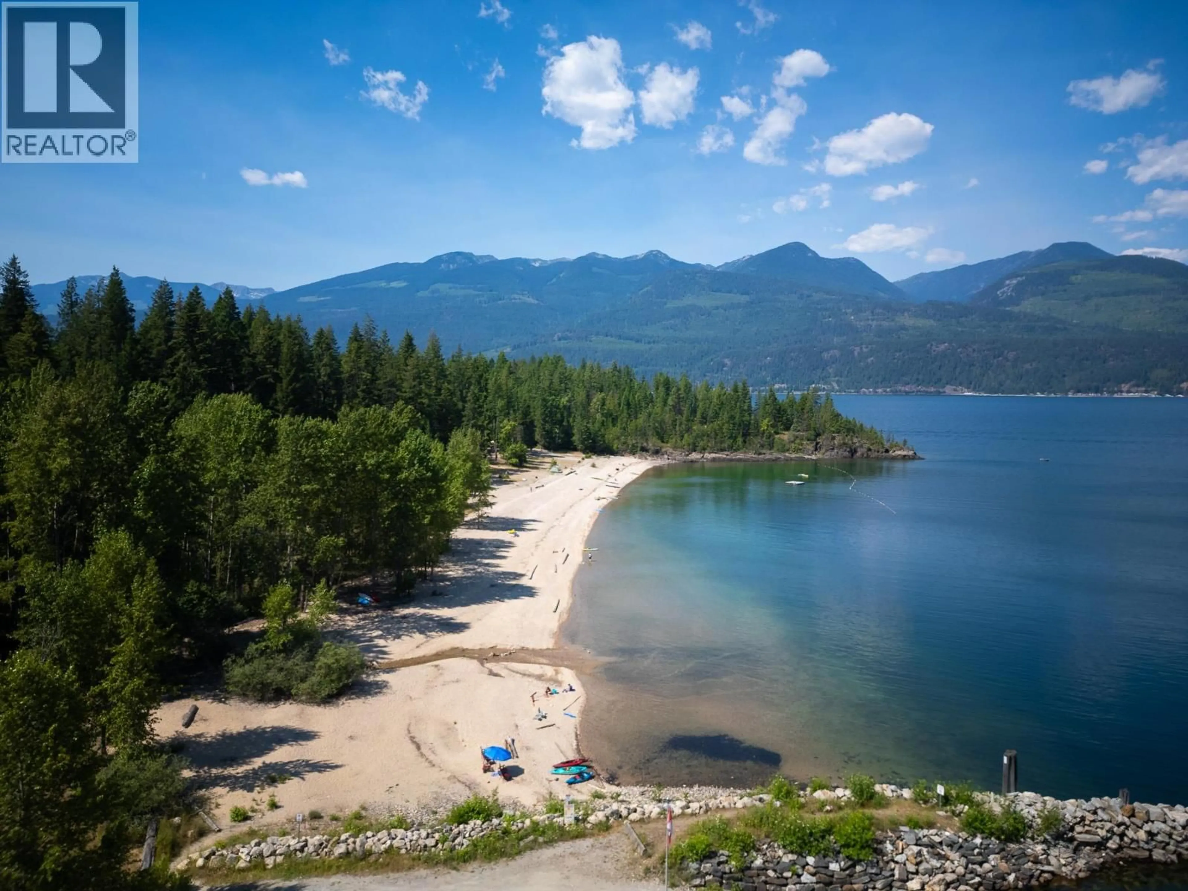 A pic from outside/outdoor area/front of a property/back of a property/a pic from drone, water/lake/river/ocean view for 1766 RIONDEL N ROAD, Riondel British Columbia V0B2B0
