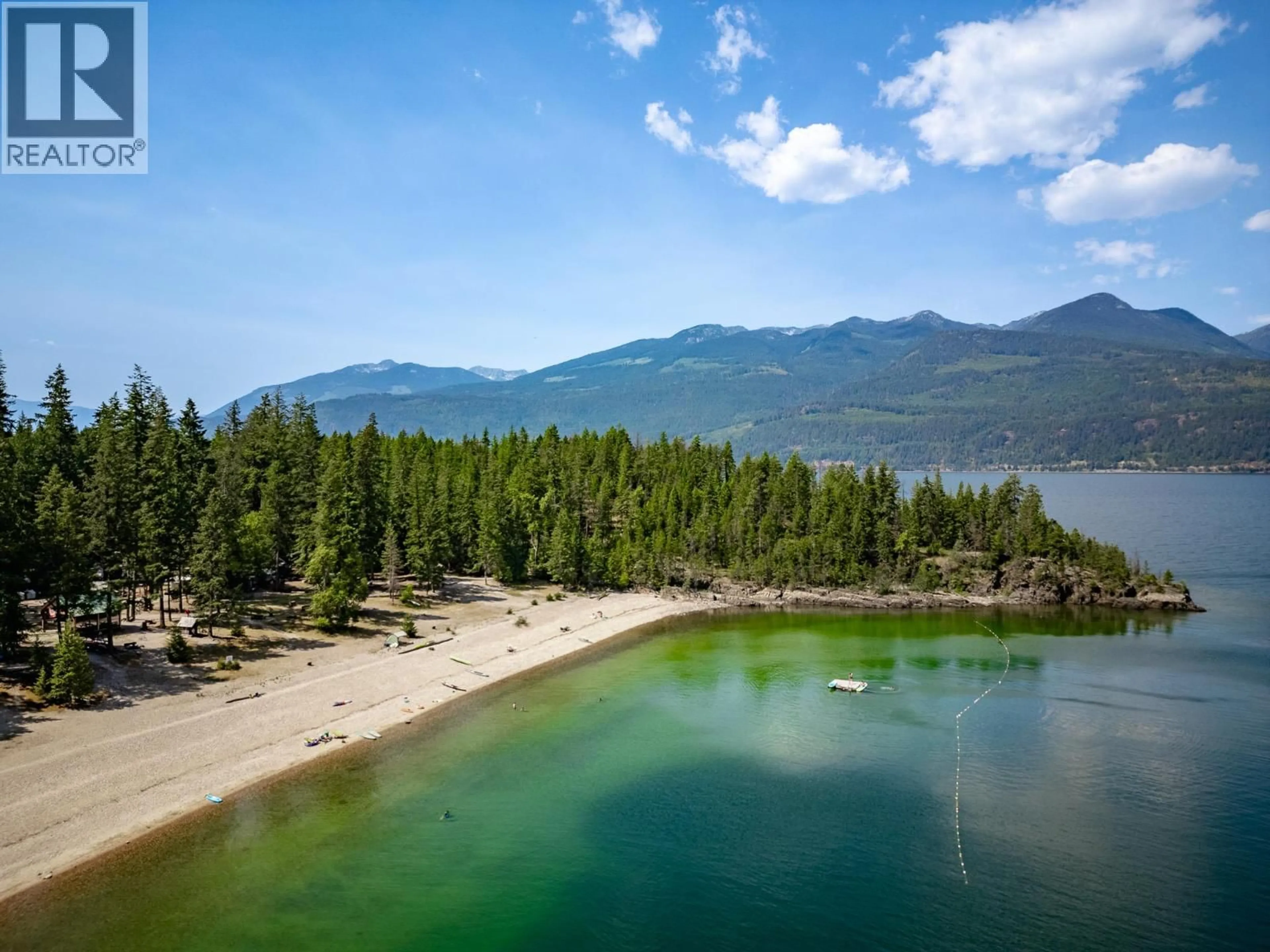 A pic from outside/outdoor area/front of a property/back of a property/a pic from drone, water/lake/river/ocean view for 1766 RIONDEL N ROAD, Riondel British Columbia V0B2B0