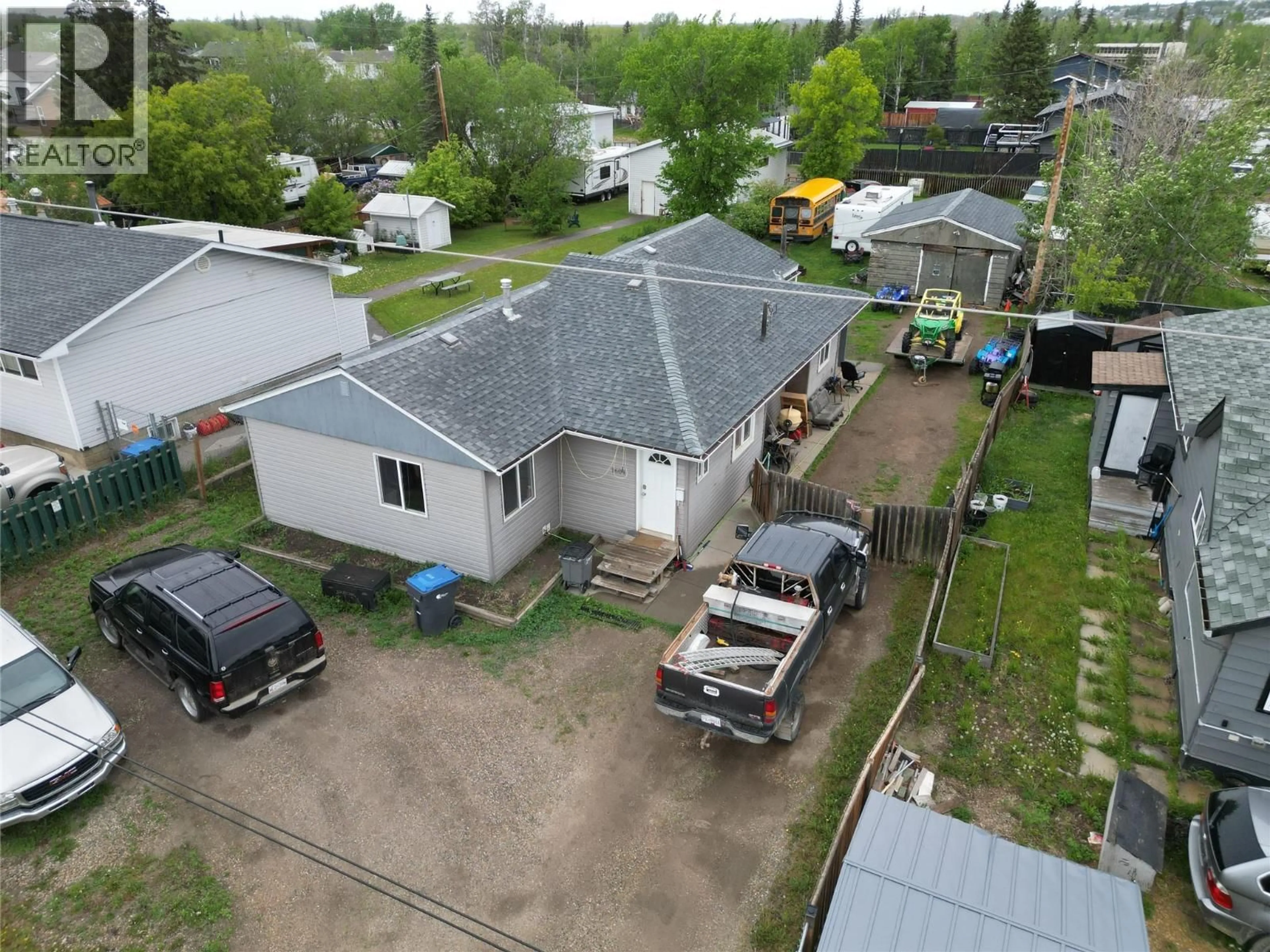 A pic from outside/outdoor area/front of a property/back of a property/a pic from drone, unknown for 1604 108 AVENUE, Dawson Creek British Columbia V1G2T6