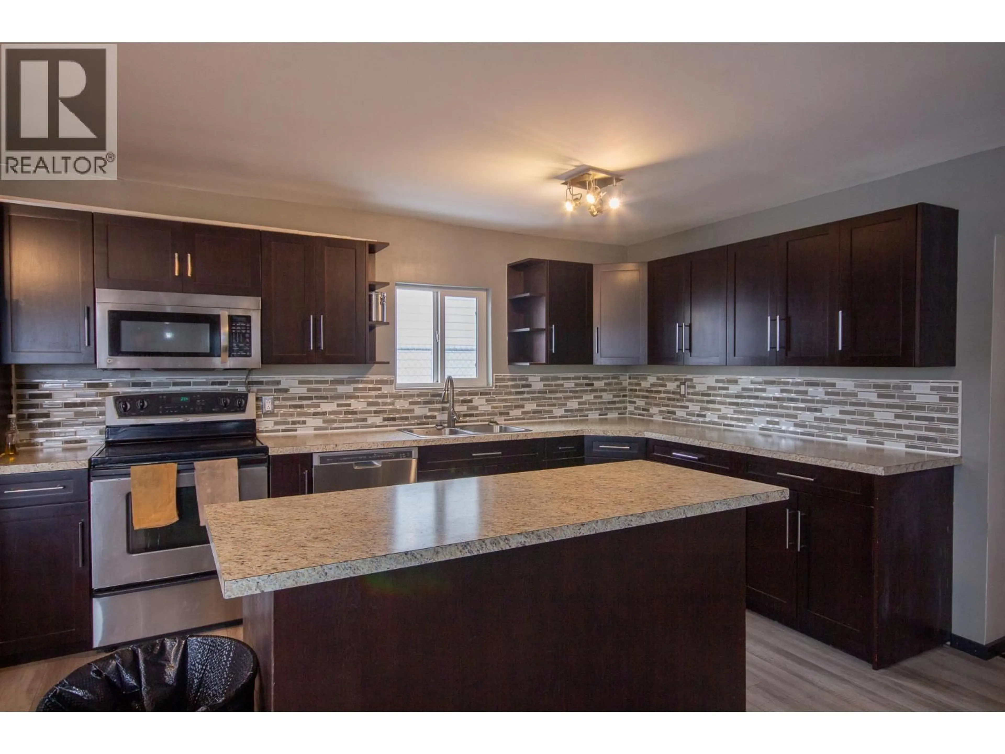 Open concept kitchen, unknown for 1604 108 AVENUE, Dawson Creek British Columbia V1G2T6