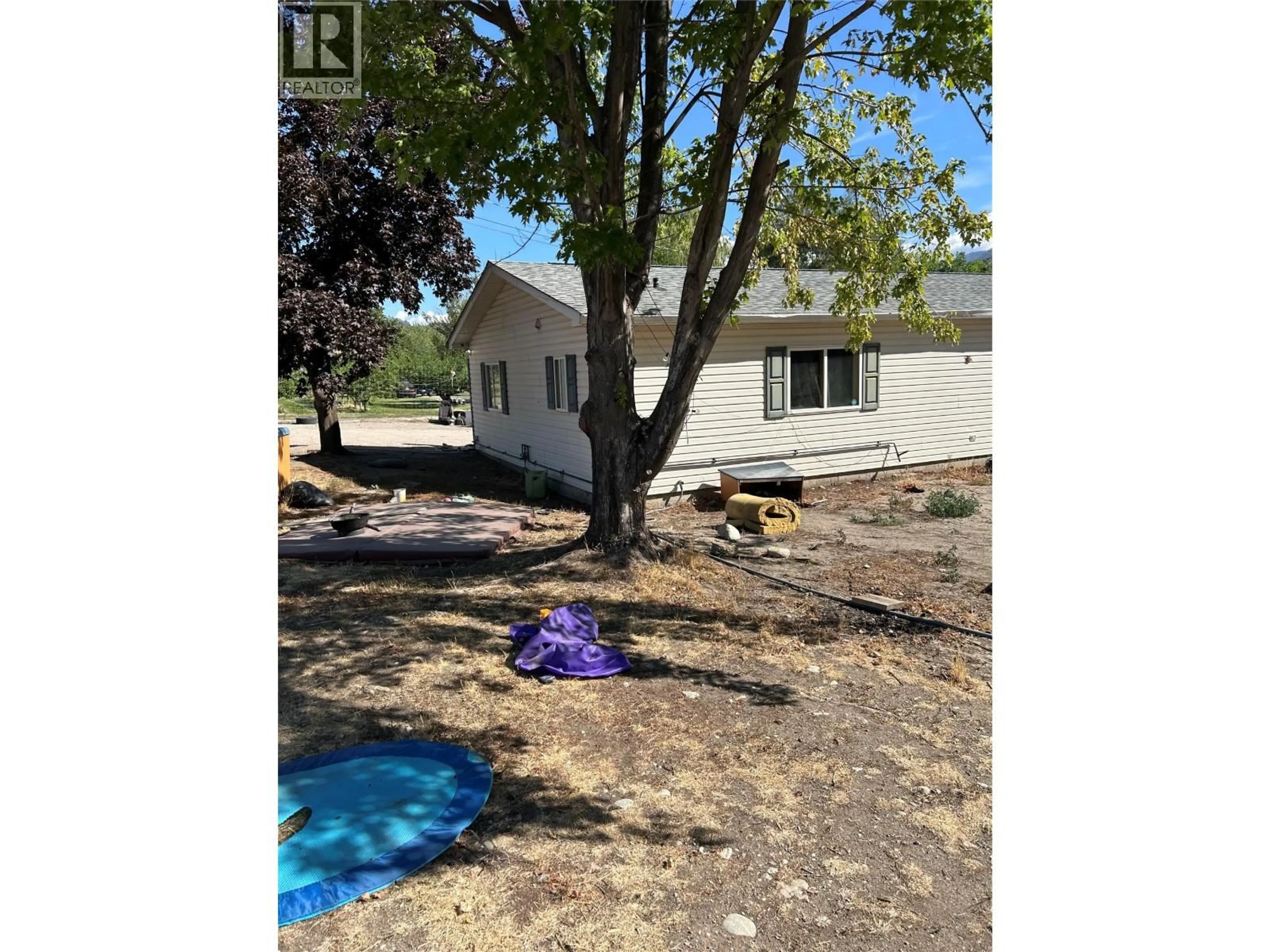A pic from outside/outdoor area/front of a property/back of a property/a pic from drone, street for 7561 HIGHWAY 97 OTHER, Oliver British Columbia V0H1T5
