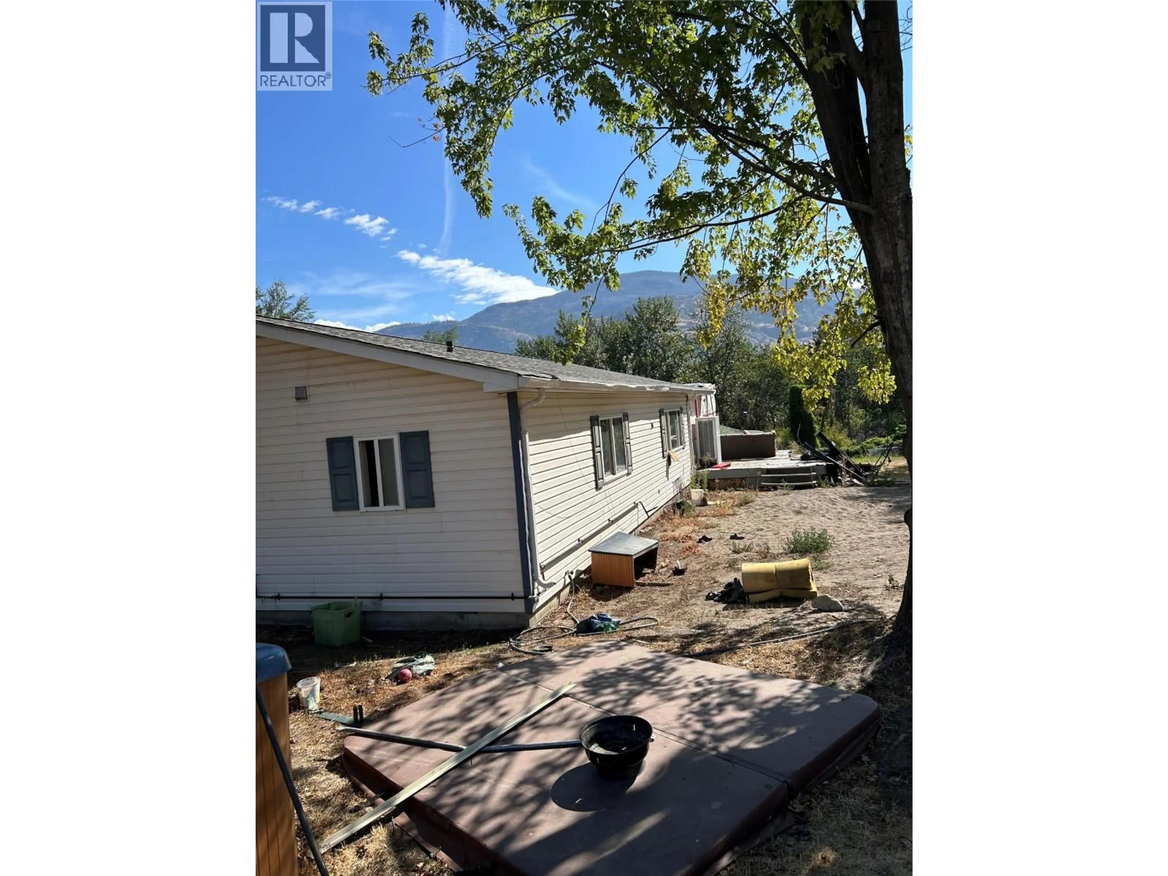 A pic from outside/outdoor area/front of a property/back of a property/a pic from drone, unknown for 7561 HIGHWAY 97 OTHER, Oliver British Columbia V0H1T5