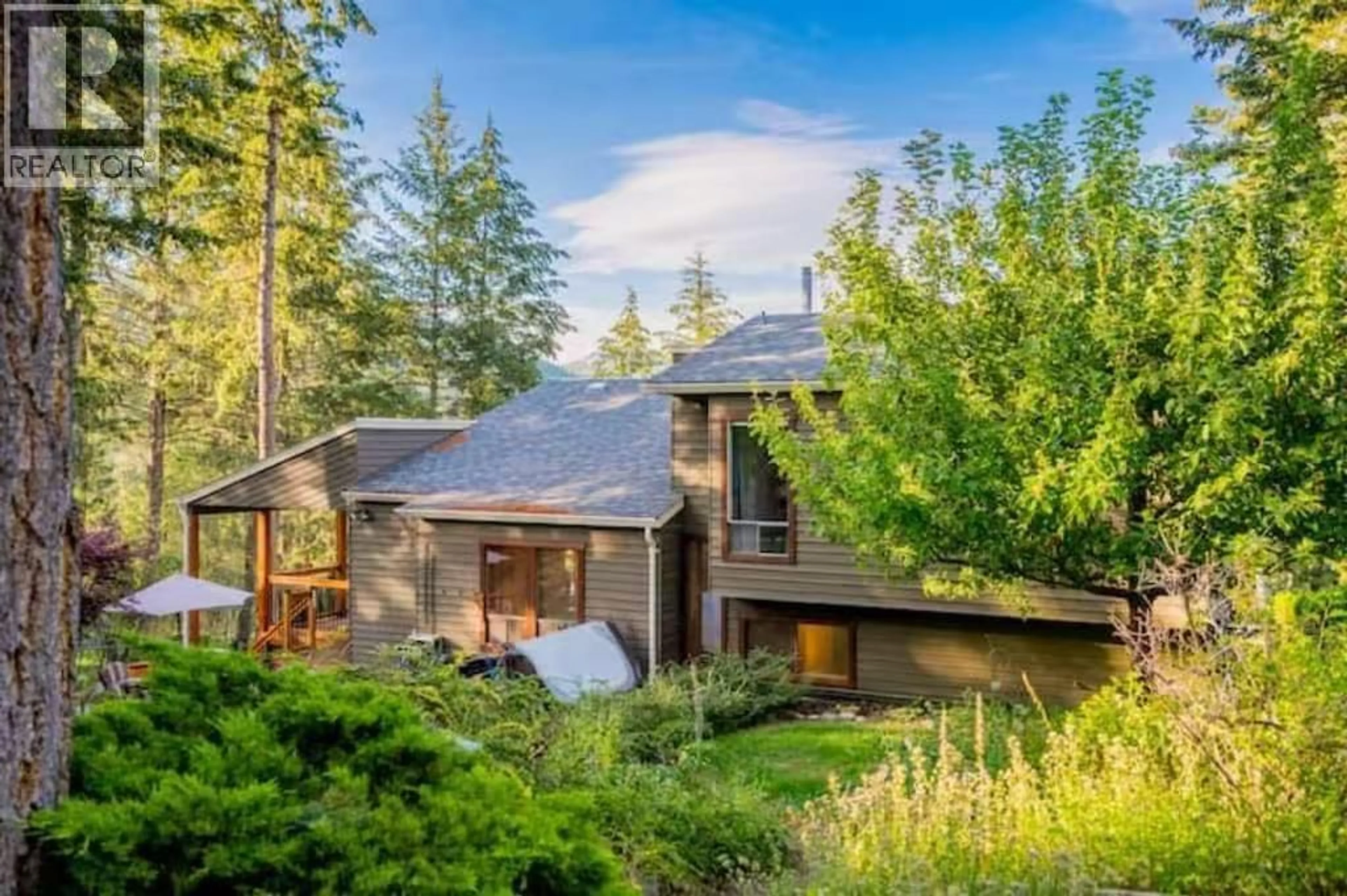 A pic from outside/outdoor area/front of a property/back of a property/a pic from drone, forest/trees view for 945 LLOYD JONES DRIVE, West Kelowna British Columbia V1Z2X9