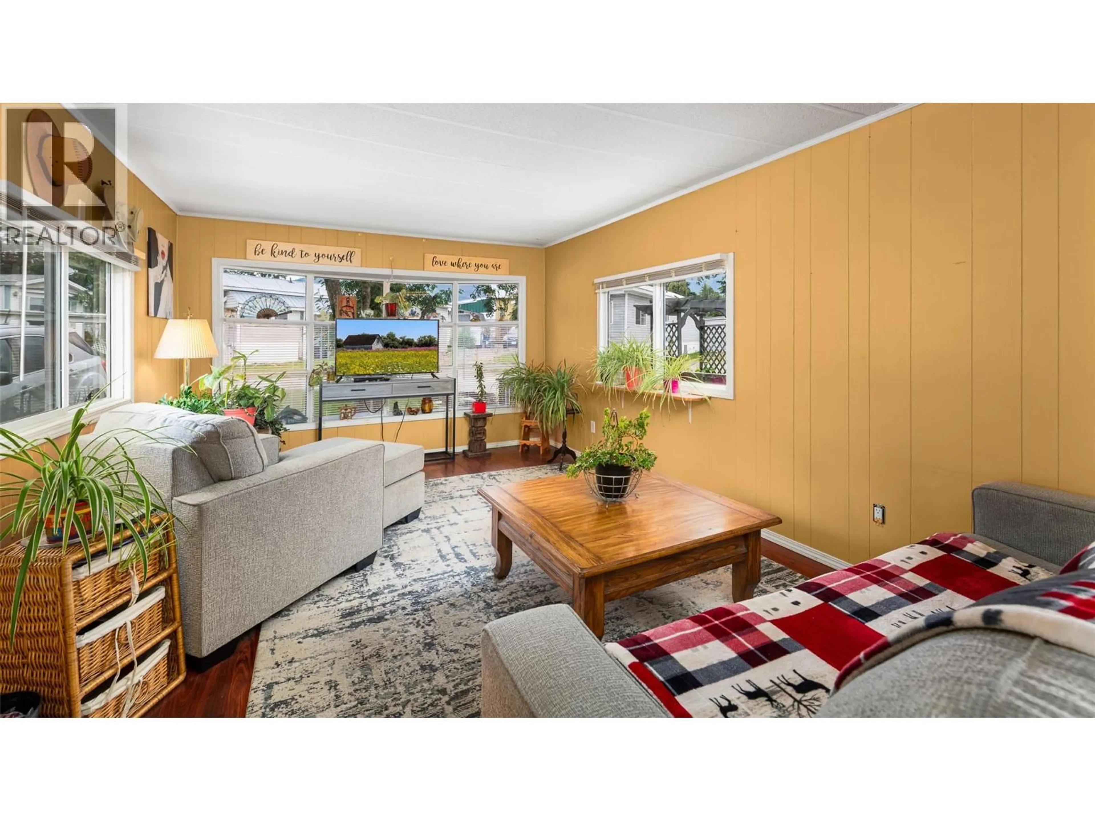 Living room with furniture, wood/laminate floor for 4 - 1421 ERICKSON STREET, Erickson British Columbia V0B1G1