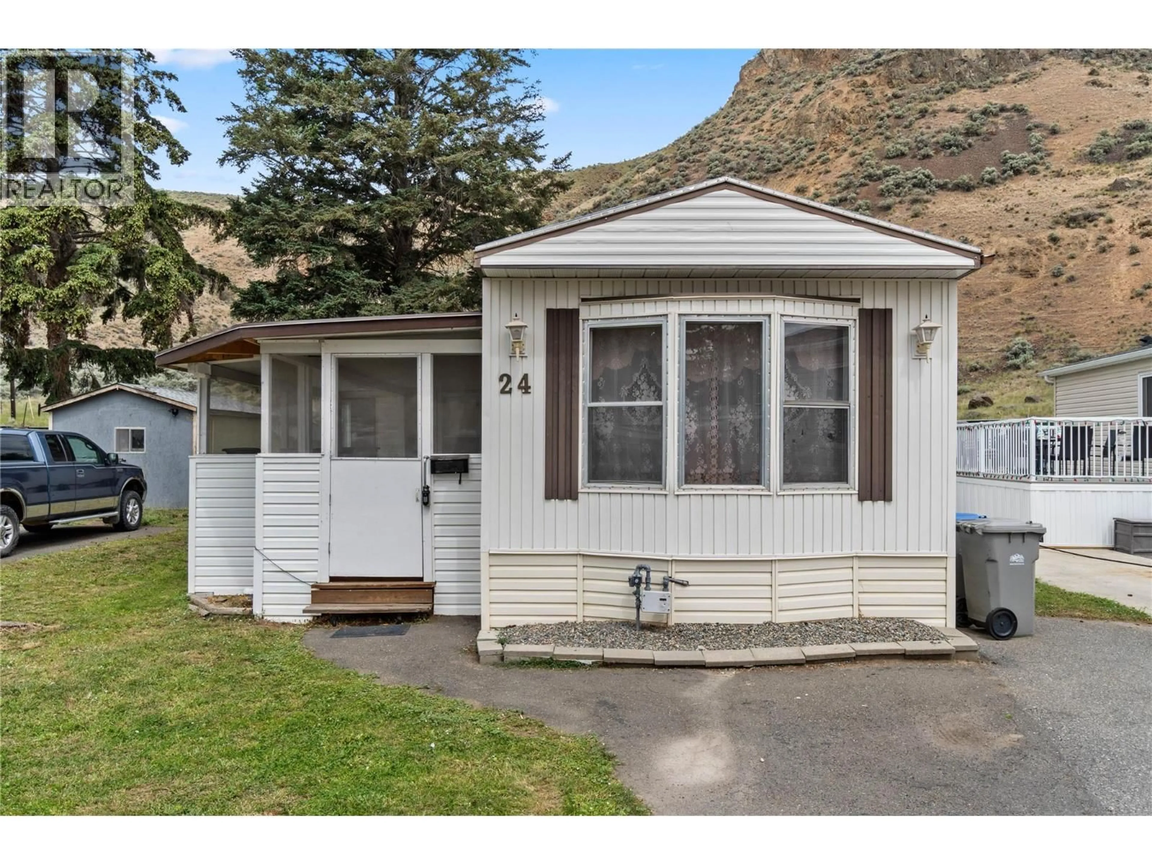 Home with vinyl exterior material, street for 24 - 2401 ORD ROAD, Kamloops British Columbia V2B7V8