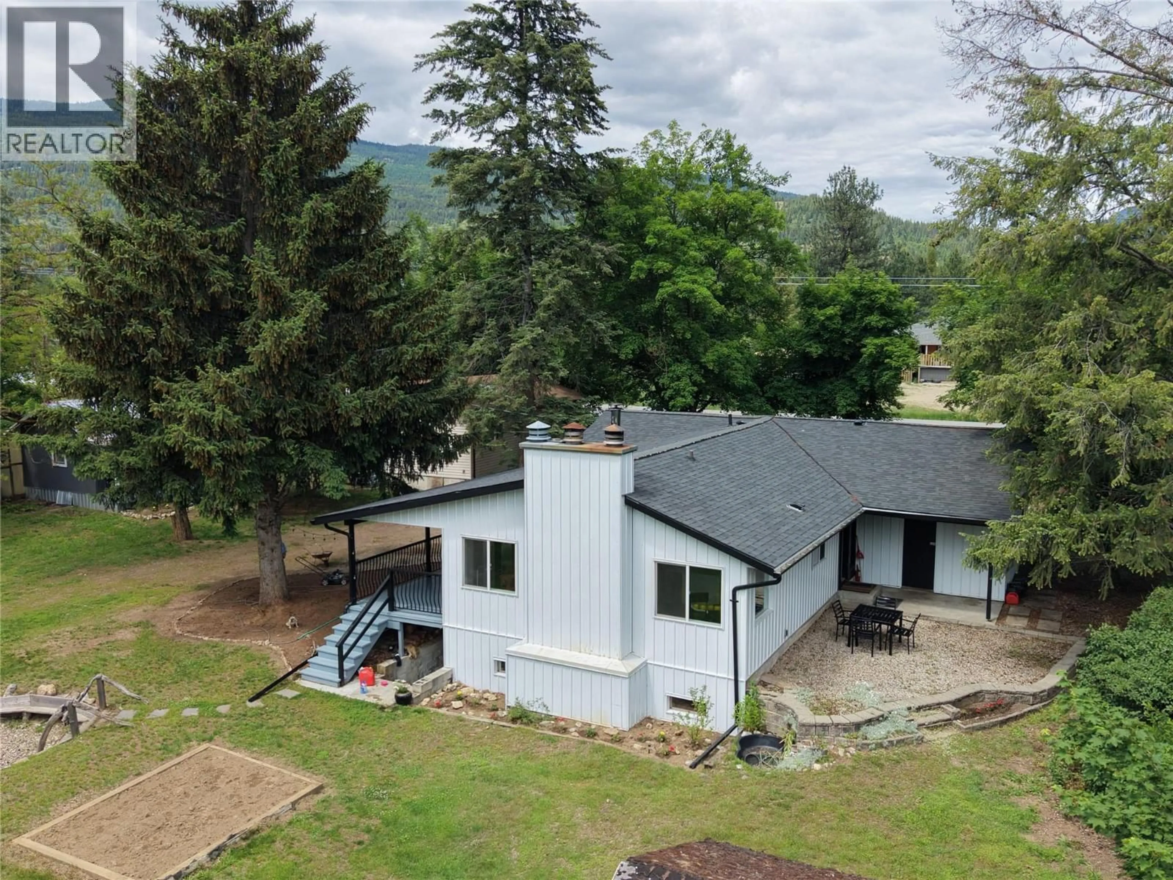 A pic from outside/outdoor area/front of a property/back of a property/a pic from drone, mountain view for 3718 KRESTOVA ROAD, Krestova British Columbia V0G1H2