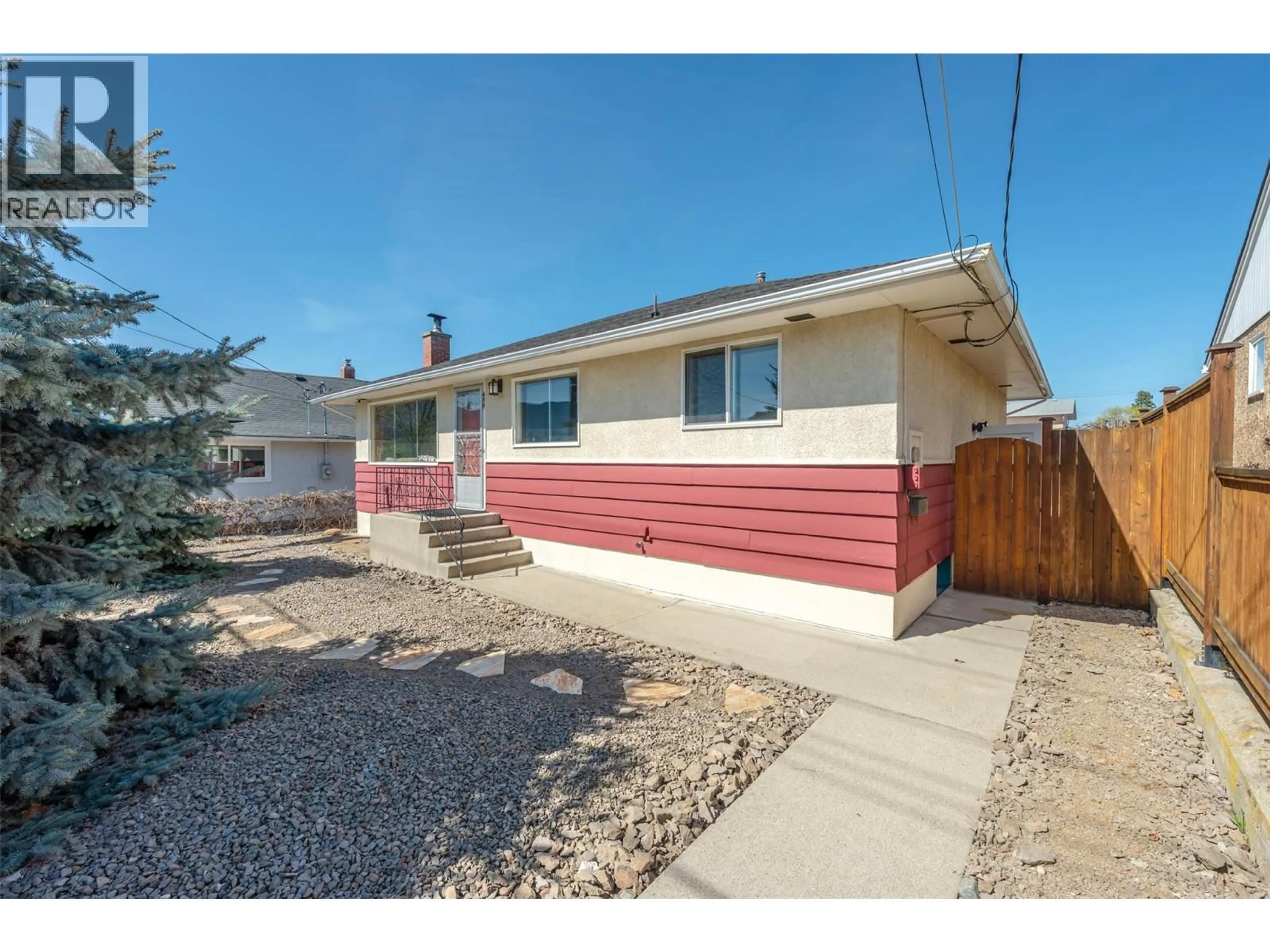 Home with vinyl exterior material, street for 459 PENTICTON AVENUE, Penticton British Columbia V2A2M5
