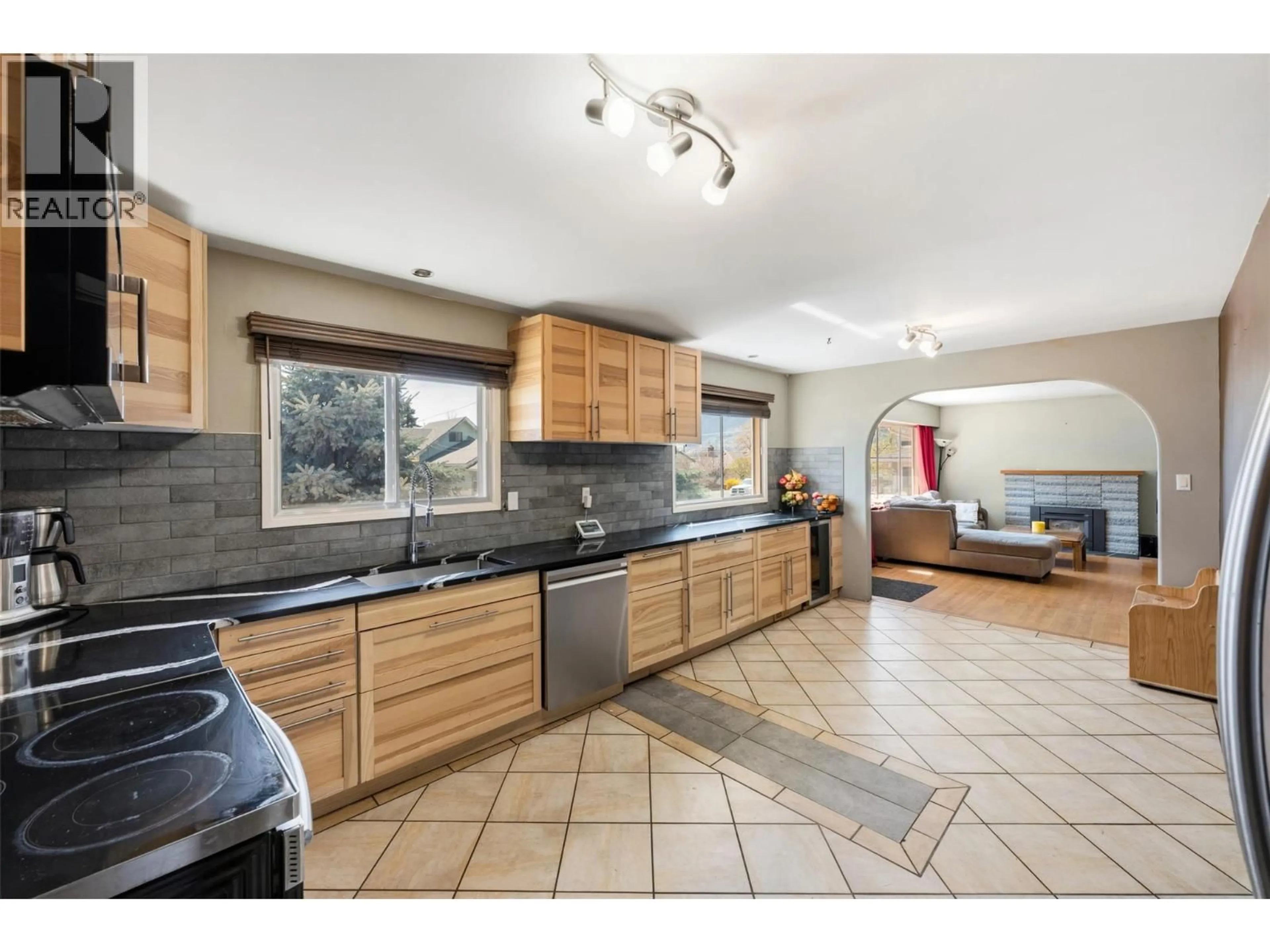 Open concept kitchen, ceramic/tile floor for 459 PENTICTON AVENUE, Penticton British Columbia V2A2M5