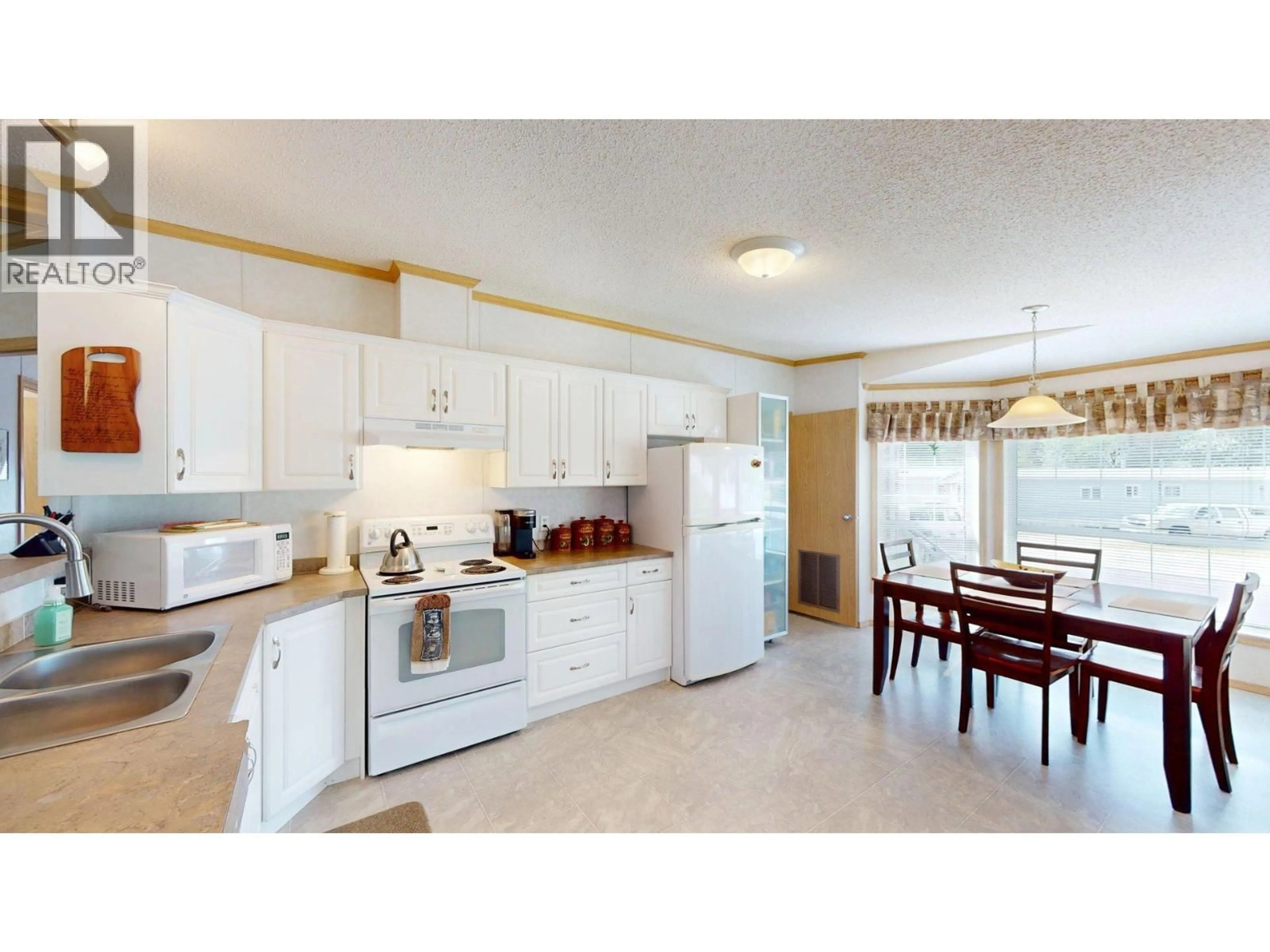 Standard kitchen, ceramic/tile floor for 50 - 500 16TH AVENUE, Genelle British Columbia V0G1G0