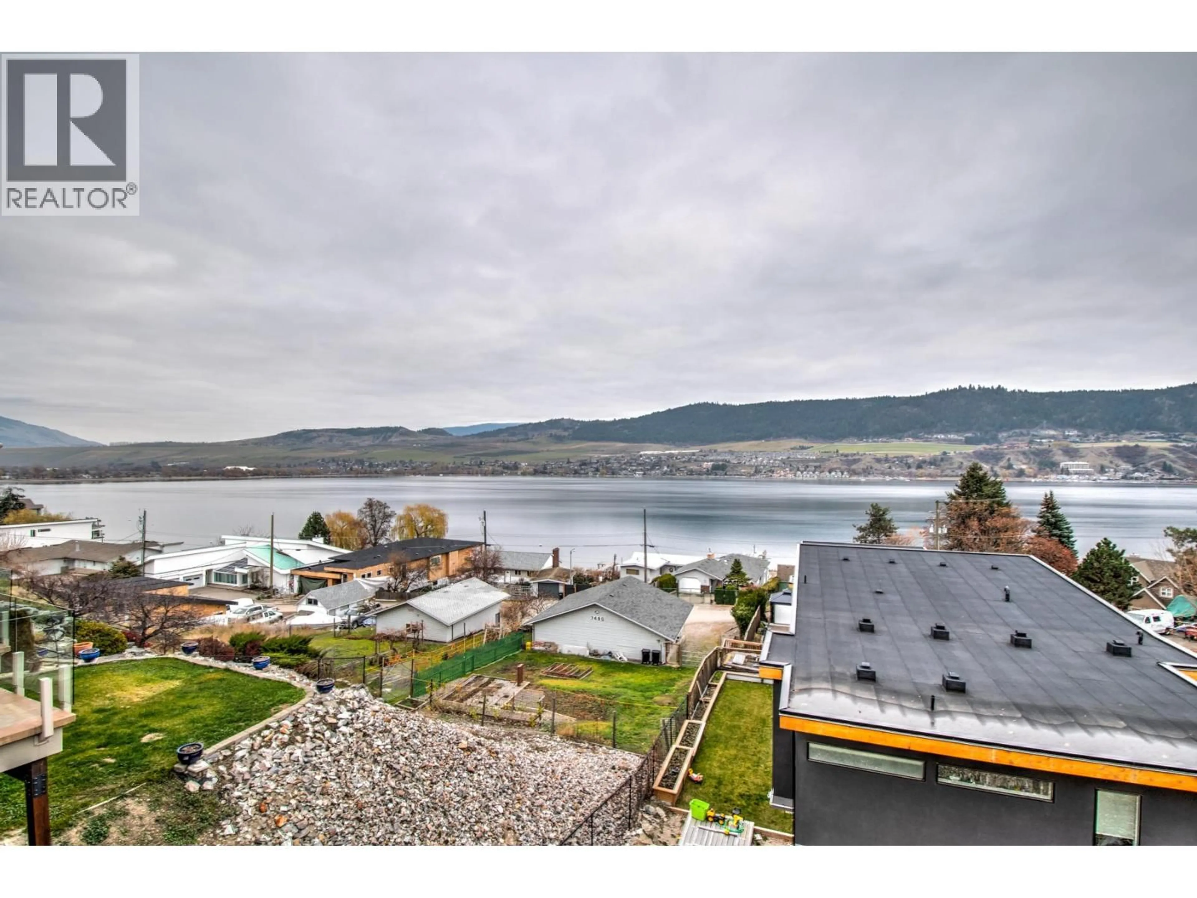 A pic from outside/outdoor area/front of a property/back of a property/a pic from drone, water/lake/river/ocean view for 7509 KENNEDY LANE, Vernon British Columbia V1H1C4