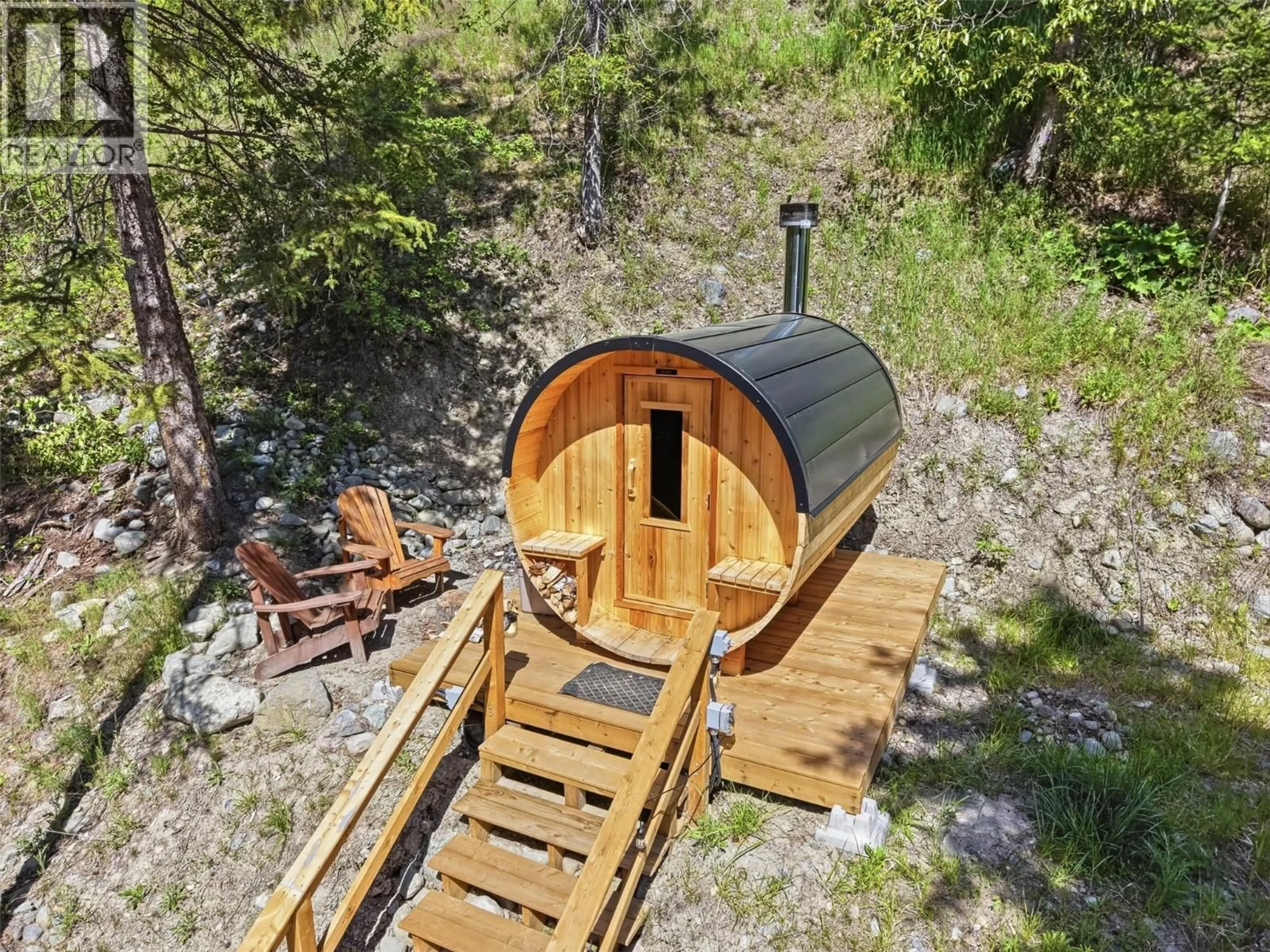 A pic from outside/outdoor area/front of a property/back of a property/a pic from drone, forest/trees view for 7384 CAHILTY CRESCENT, Kamloops British Columbia V0E5N0