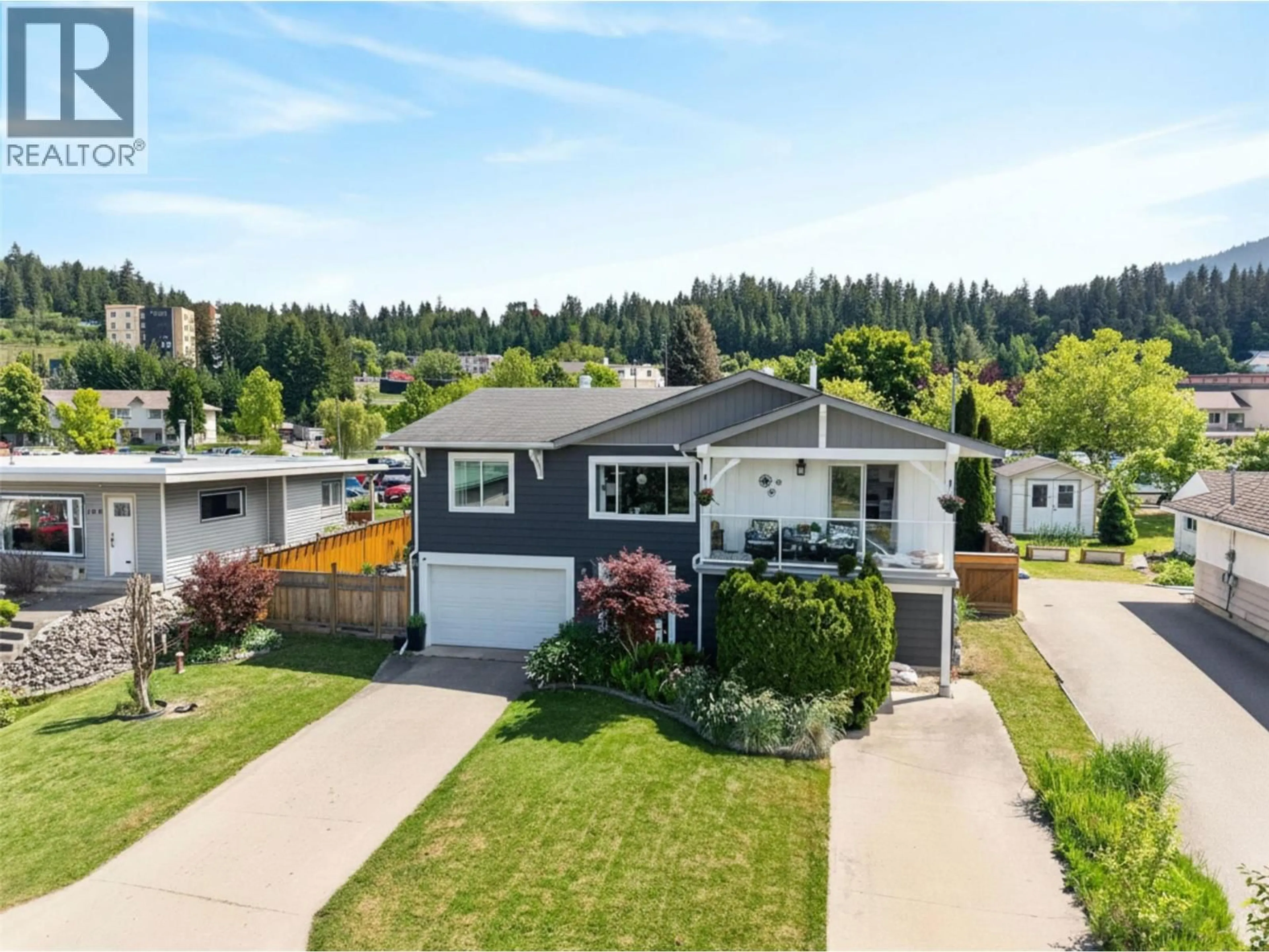 A pic from outside/outdoor area/front of a property/back of a property/a pic from drone, street for 1050 8 AVENUE NORTHEAST, Salmon Arm British Columbia V1E4A4