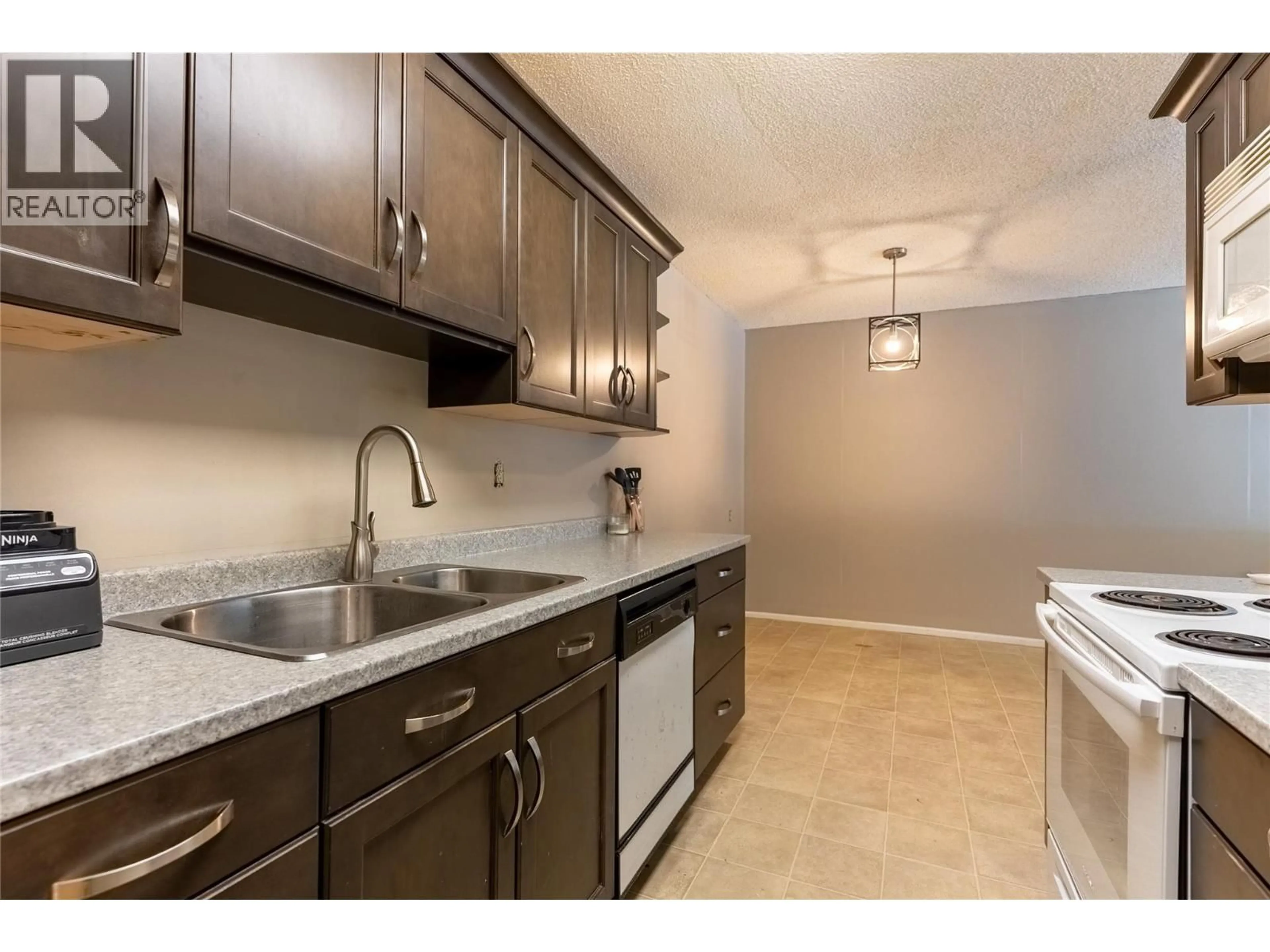 Standard kitchen, ceramic/tile floor for 101 - 279 ALDER DRIVE, Logan Lake British Columbia V0K1W0