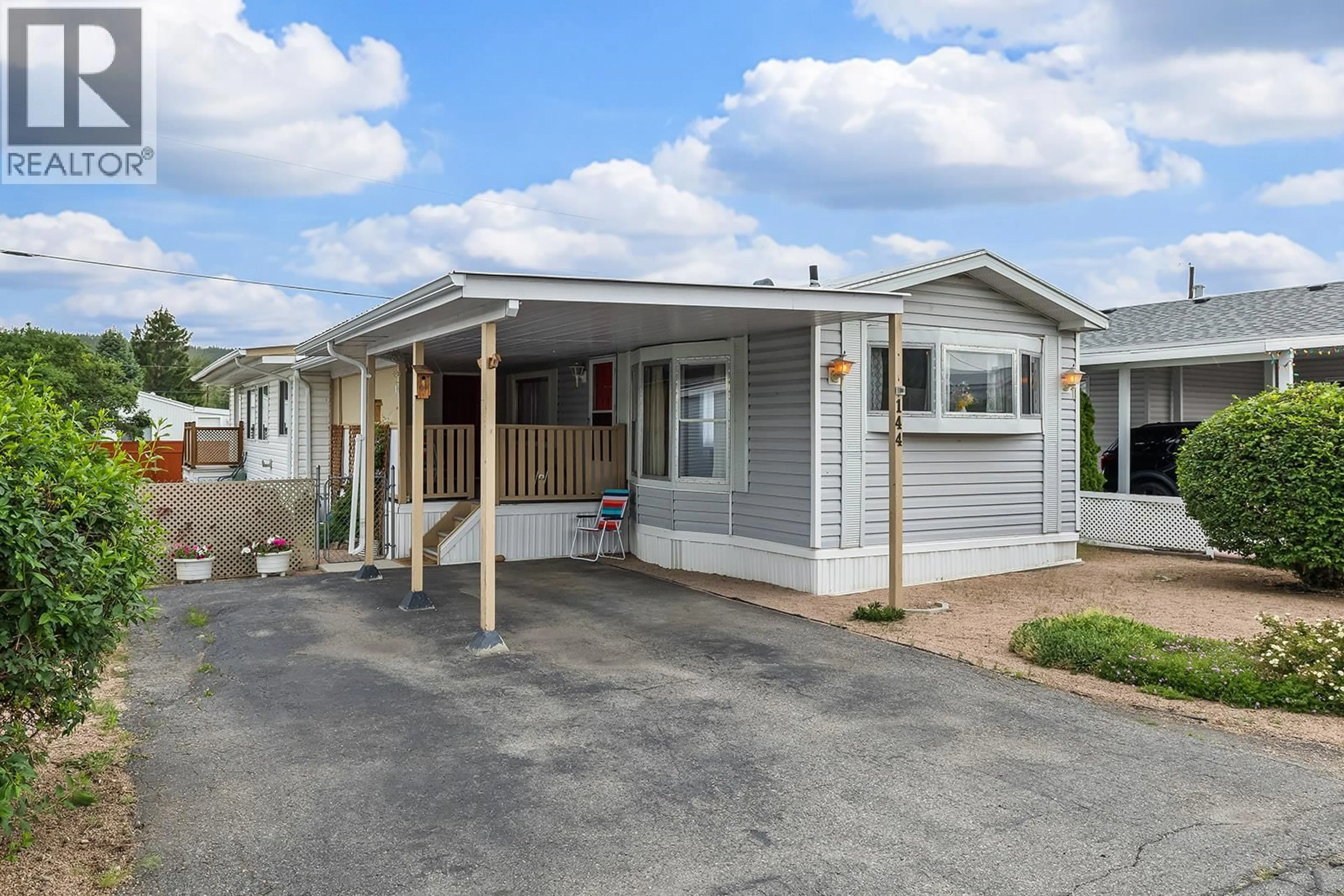 Home with vinyl exterior material, street for 144 - 720 COMMONWEALTH ROAD, Kelowna British Columbia V4V1R9