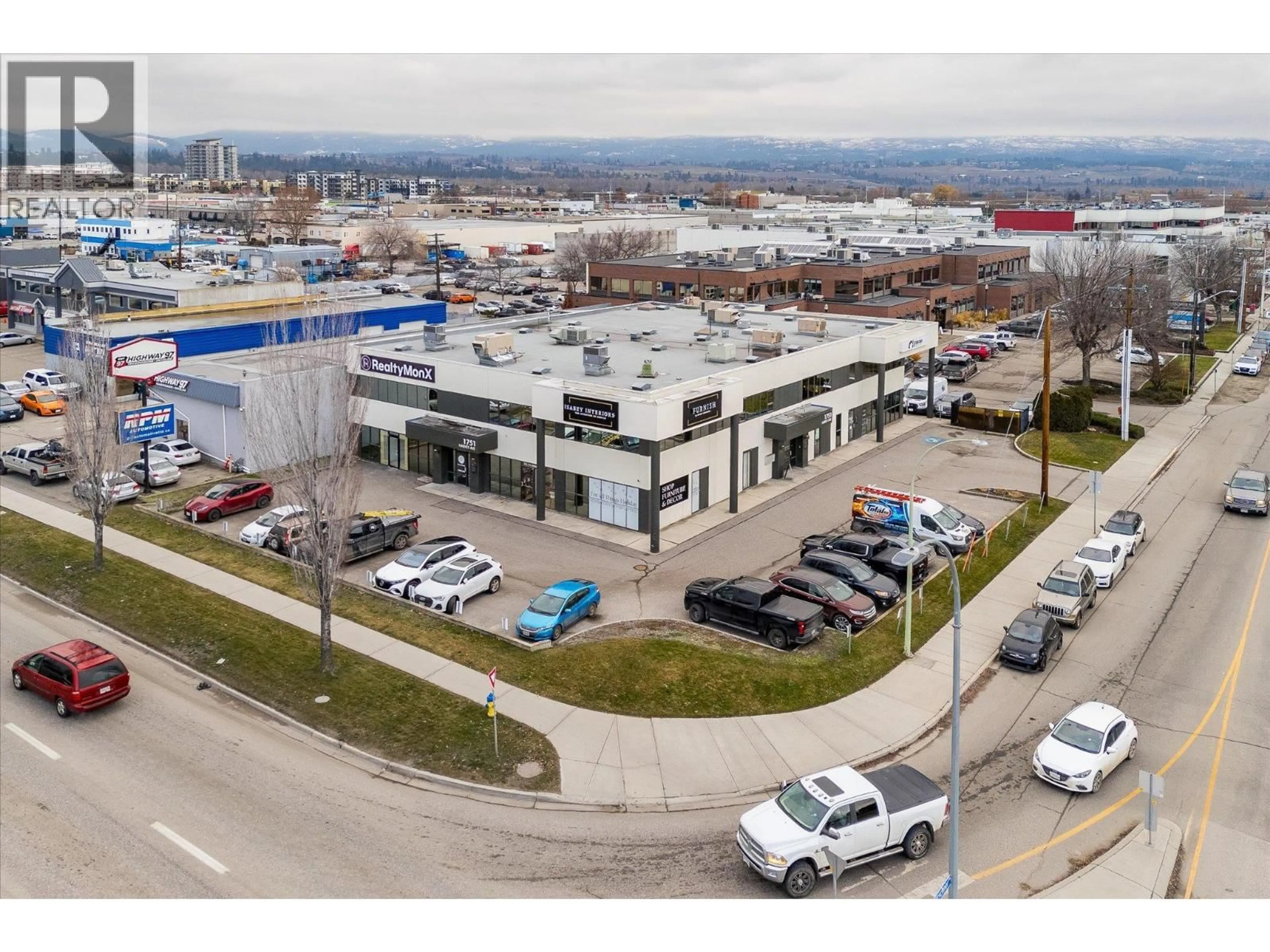 A pic from outside/outdoor area/front of a property/back of a property/a pic from drone, unknown for 110 - 1751 HARVEY AVENUE, Kelowna British Columbia V1Y6G4
