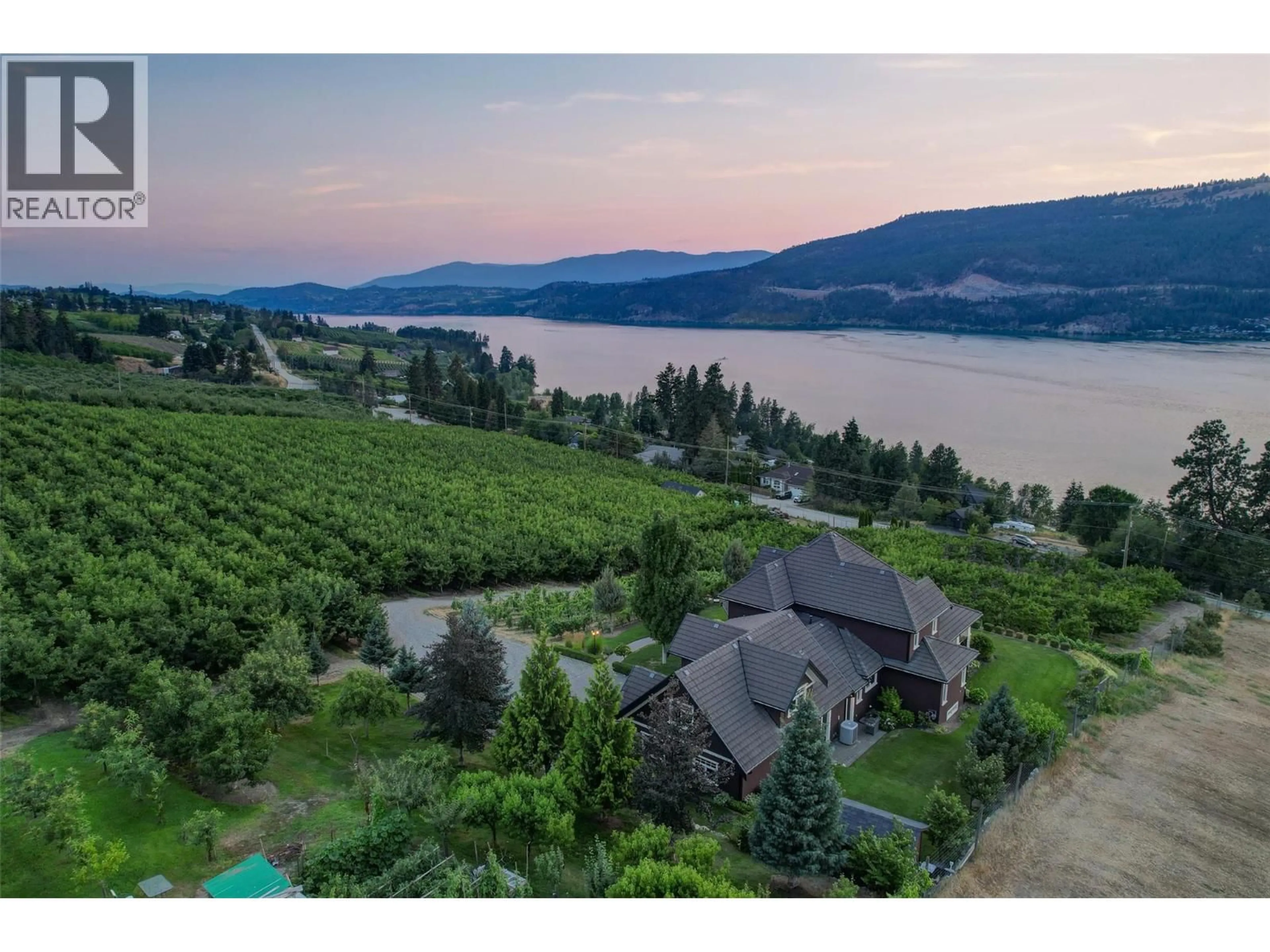 A pic from outside/outdoor area/front of a property/back of a property/a pic from drone, water/lake/river/ocean view for 14911 OYAMA ROAD, Lake Country British Columbia V4V2C6