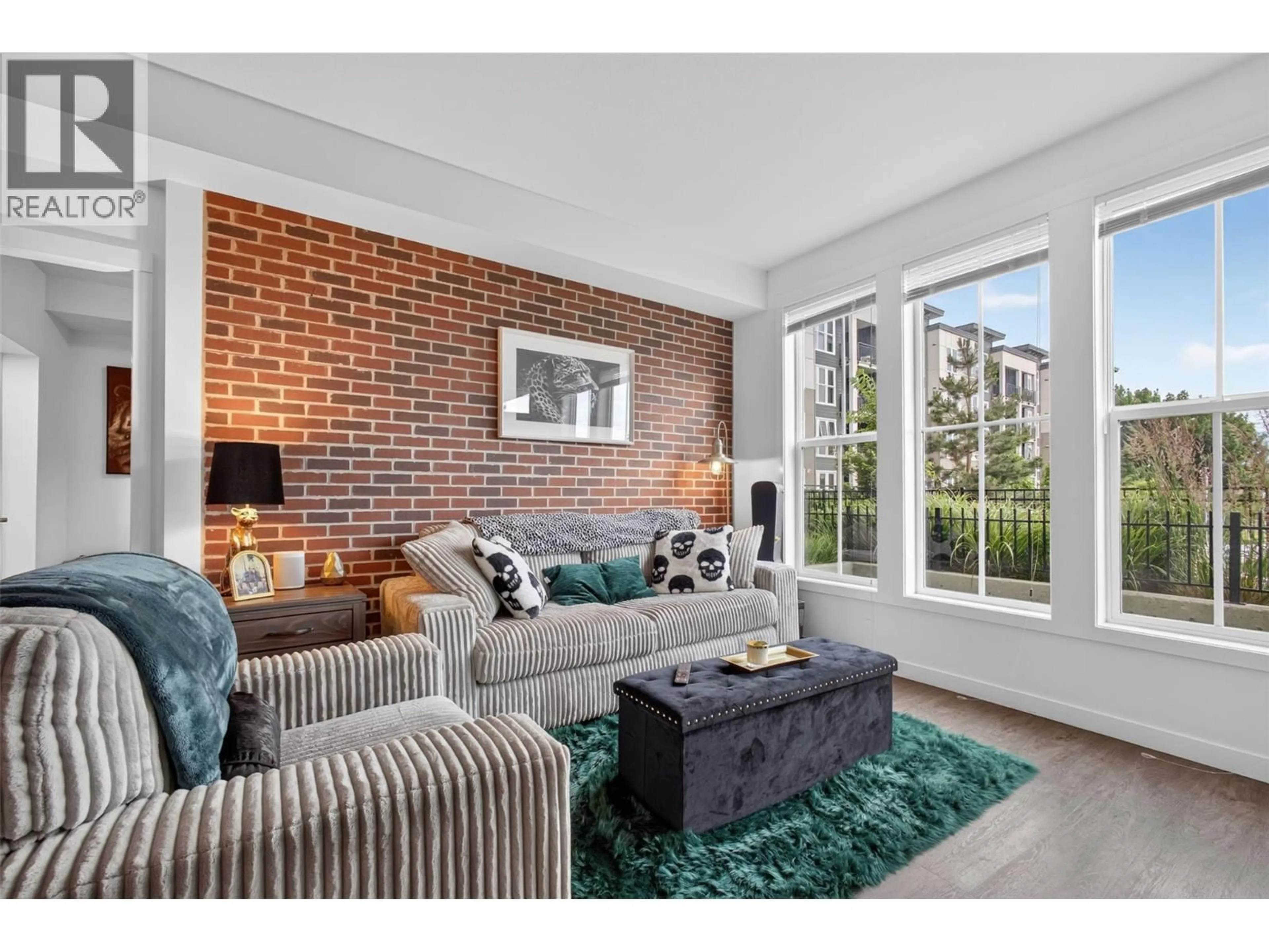 Living room with furniture, unknown for 110 - 1770 RICHTER STREET, Kelowna British Columbia V1Y0E6