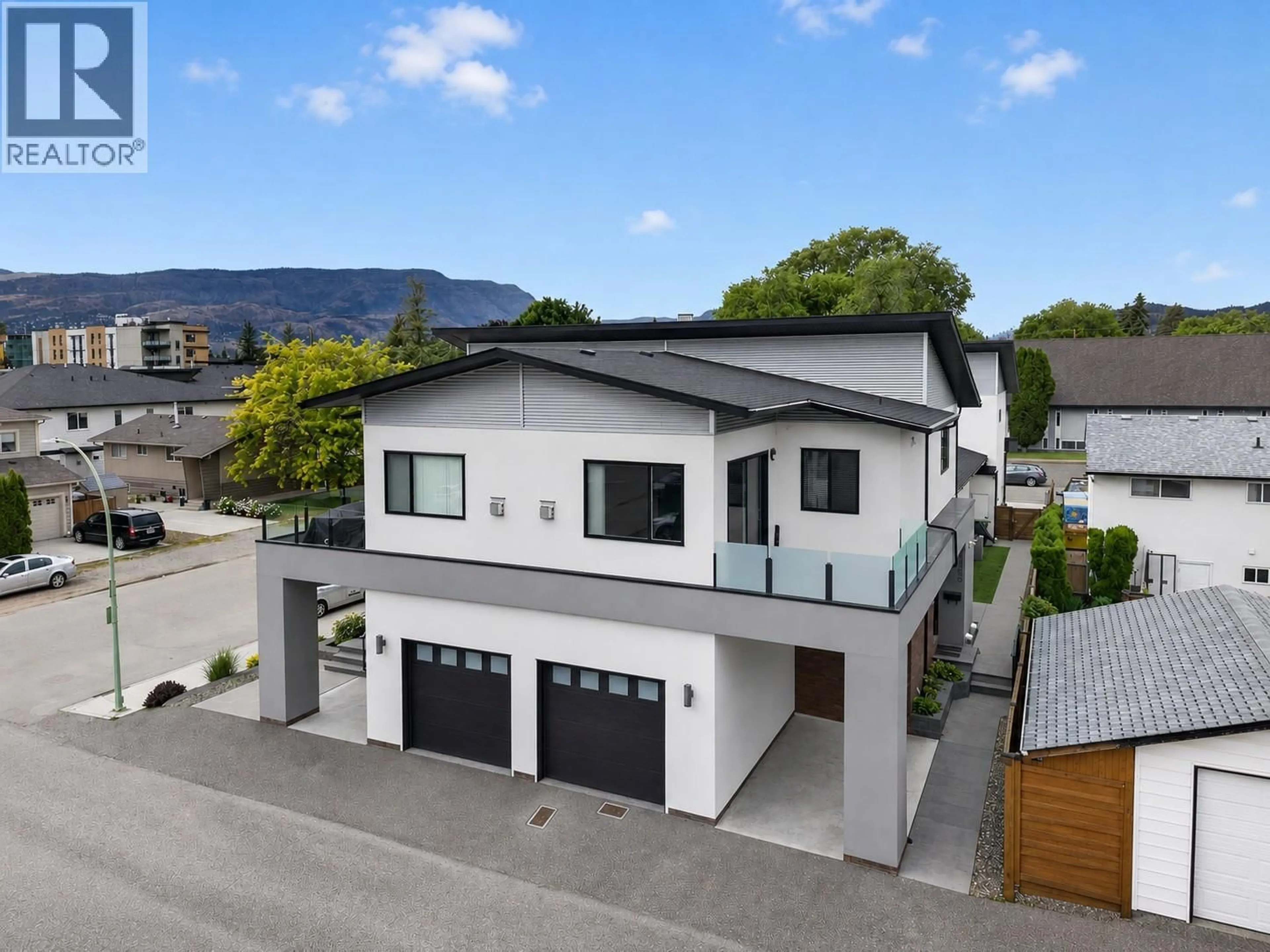 A pic from outside/outdoor area/front of a property/back of a property/a pic from drone, mountain view for 2763 CURTS STREET, Kelowna British Columbia V1Y2T8