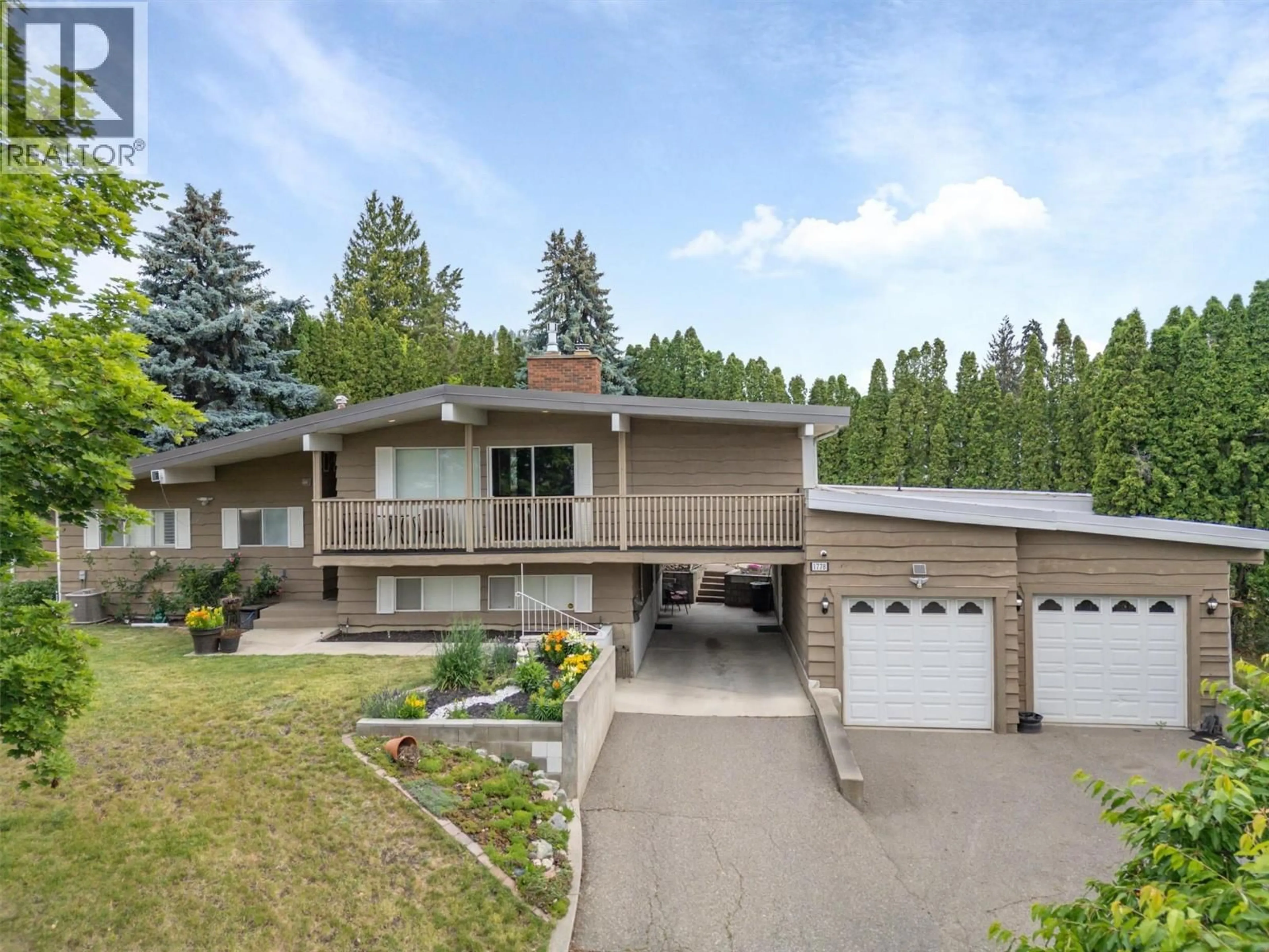 A pic from outside/outdoor area/front of a property/back of a property/a pic from drone, street for 1778 SMITHSON DRIVE, Kelowna British Columbia V1Y4E3