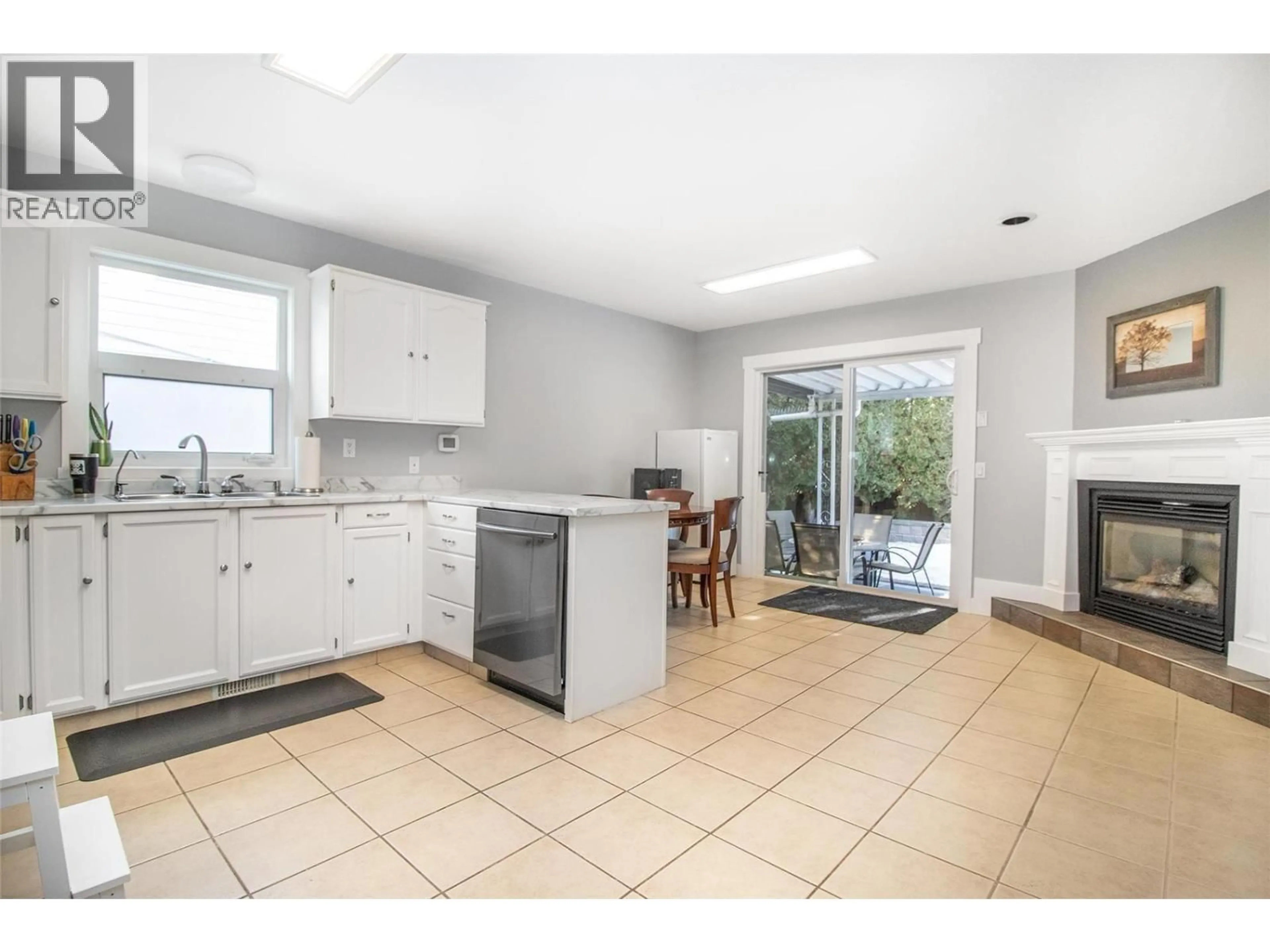 Open concept kitchen, ceramic/tile floor for 1325 BOTHE ROAD, Kelowna British Columbia V1W3C1