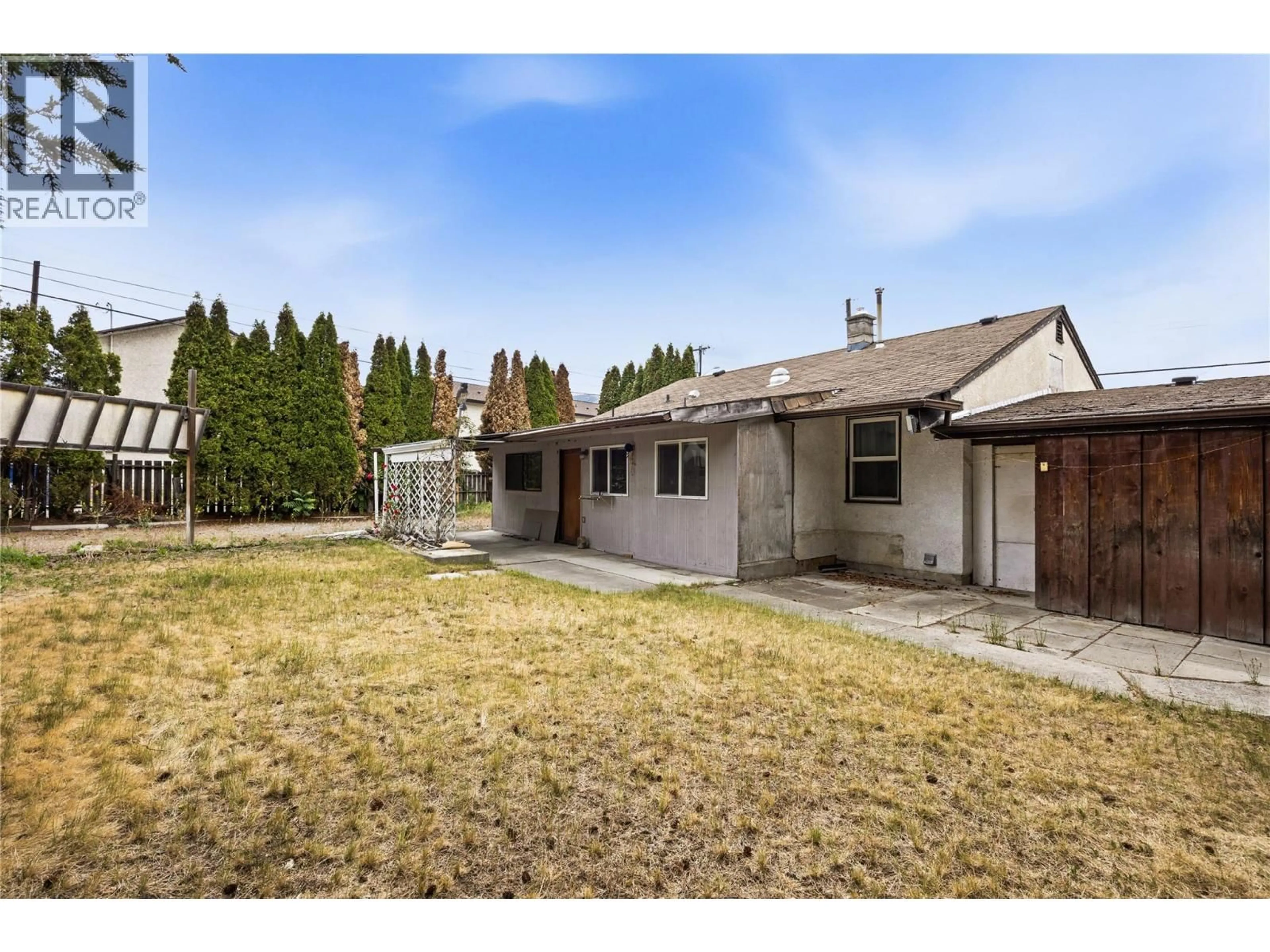 A pic from outside/outdoor area/front of a property/back of a property/a pic from drone, street for 39 GRANBY PLACE, Penticton British Columbia V2A2Z3