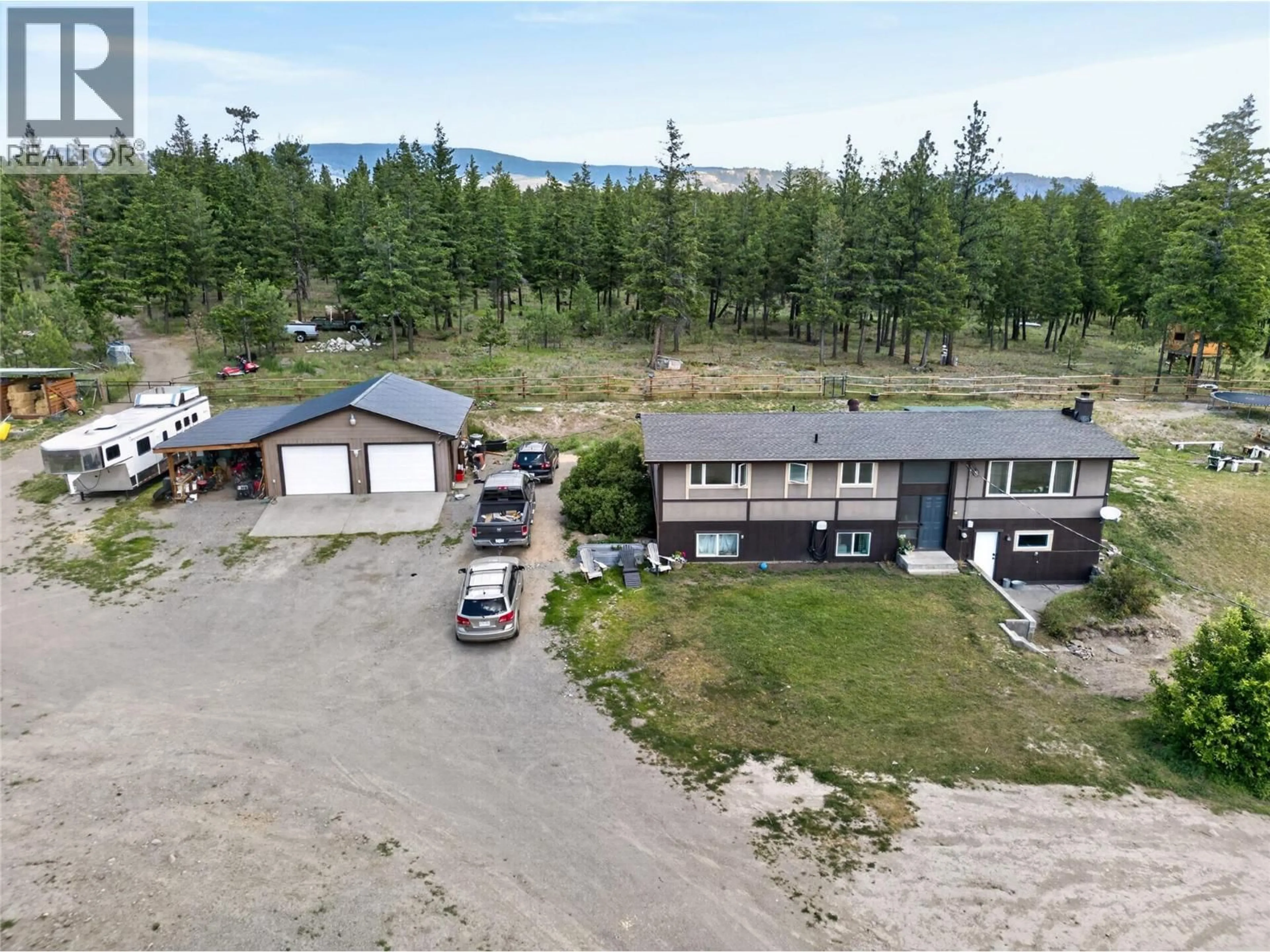 A pic from outside/outdoor area/front of a property/back of a property/a pic from drone, mountain view for 1497 WATSON LARSON ROAD, Kamloops British Columbia V2C6Y1