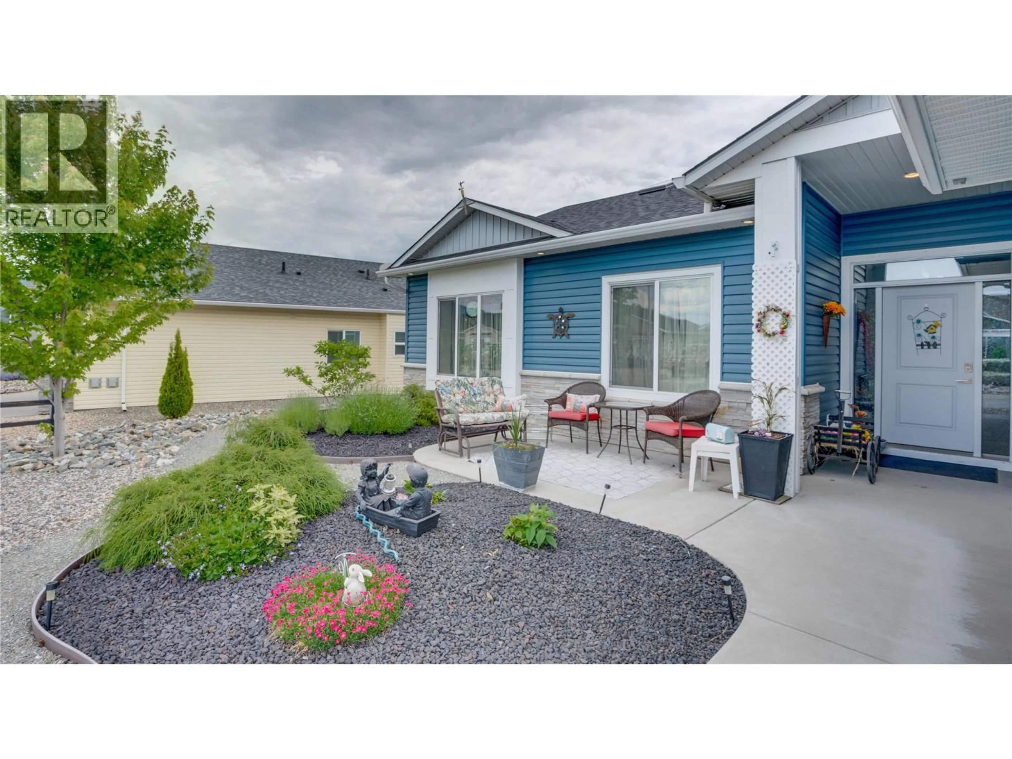 Home with vinyl exterior material, street for 903 9 AVENUE, Vernon British Columbia V1H1Z1