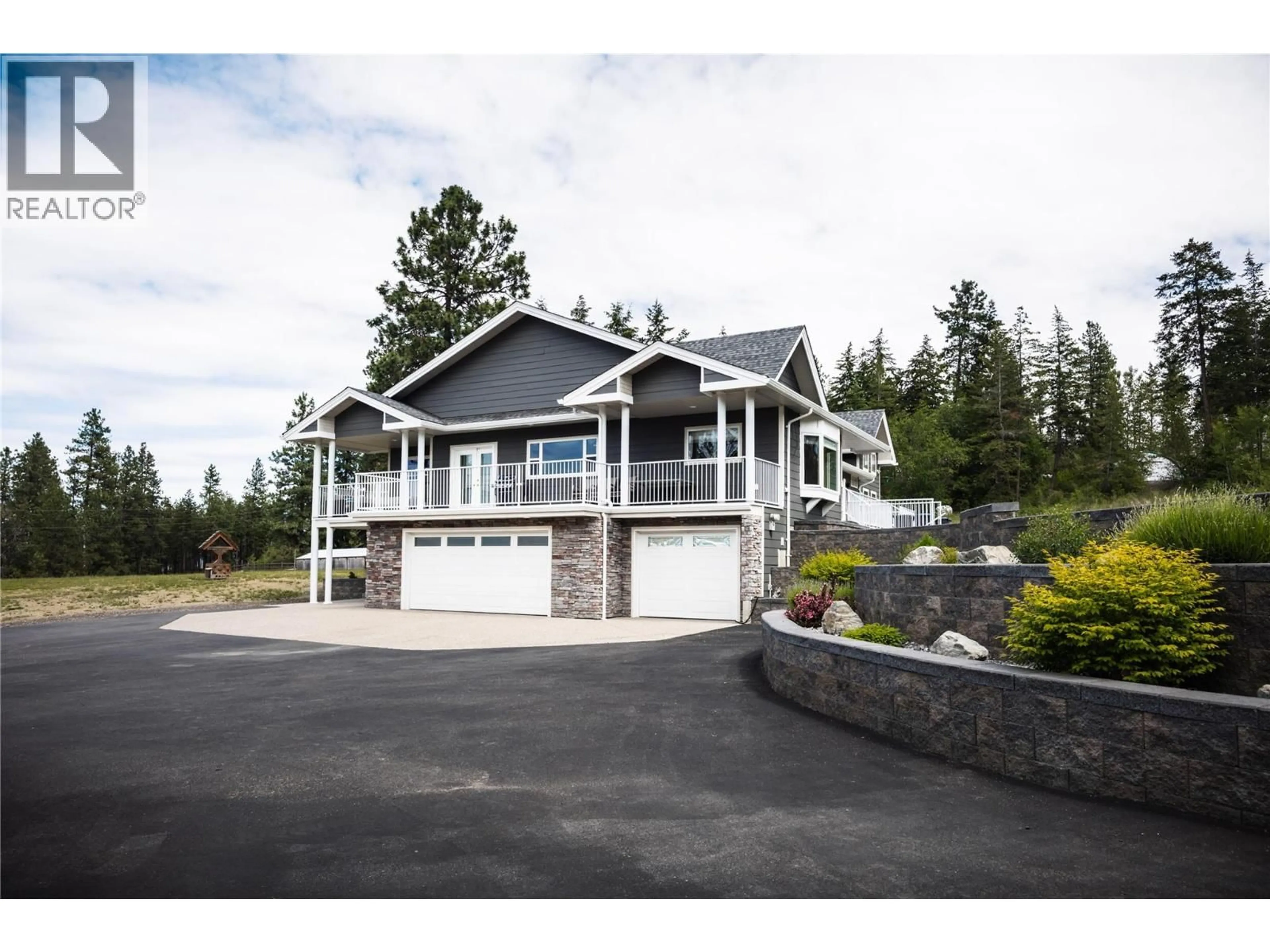 Home with vinyl exterior material, water/lake/river/ocean view for 4430 JUNE SPRINGS ROAD, Kelowna British Columbia V1W4C8