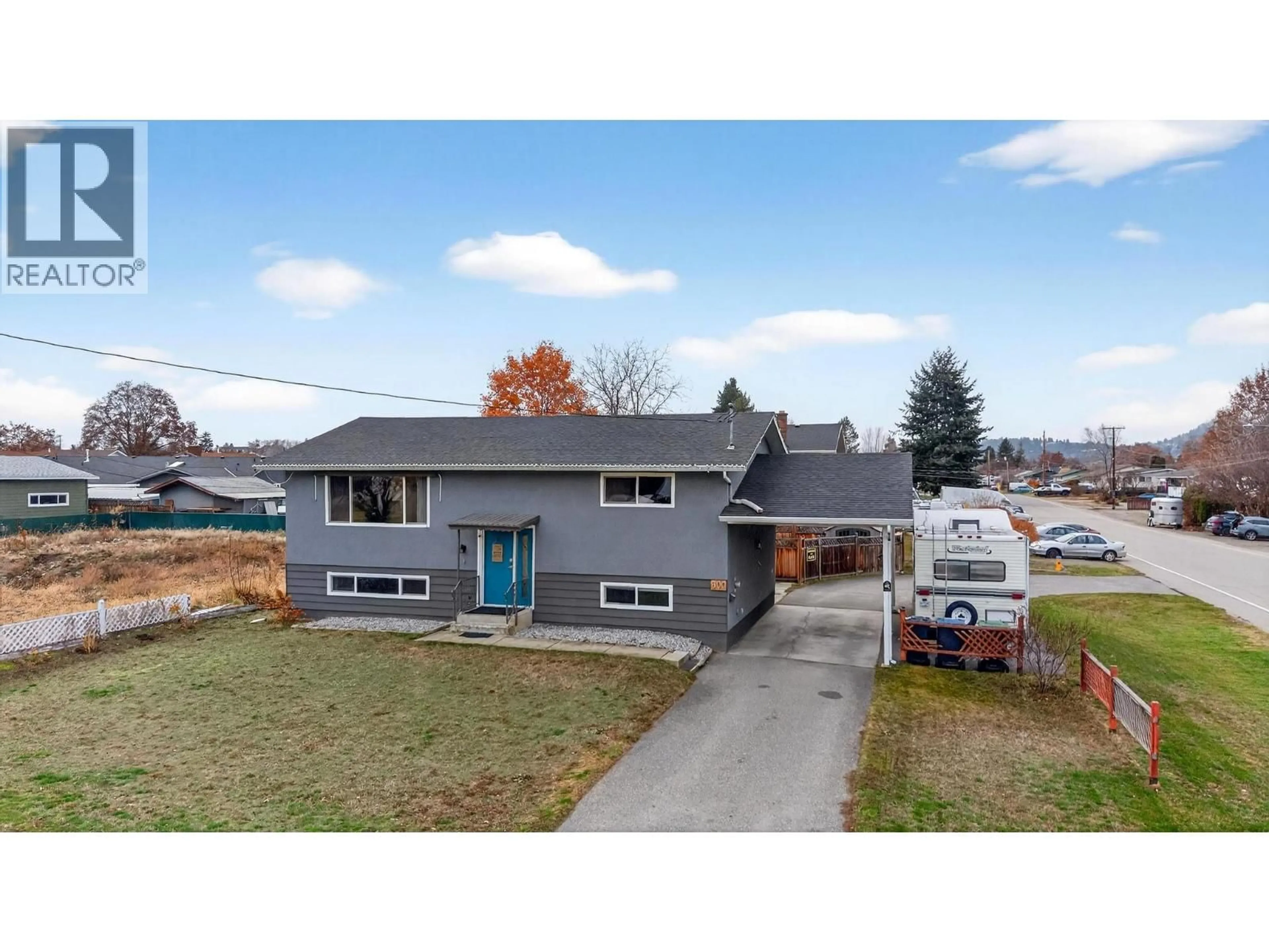 A pic from outside/outdoor area/front of a property/back of a property/a pic from drone, street for 300 LANGFORD ROAD, Kelowna British Columbia V1X2T8