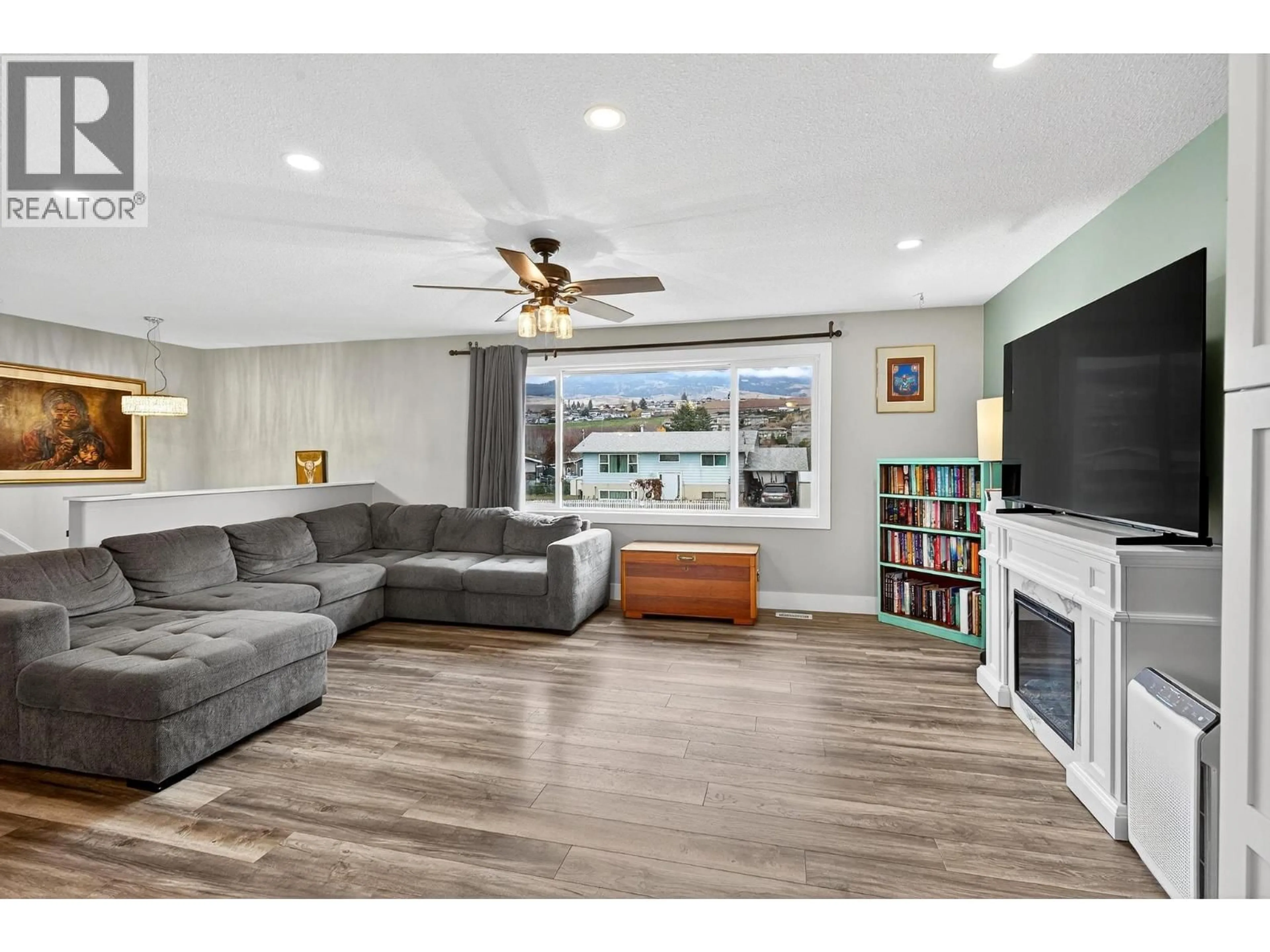 Living room with furniture, unknown for 300 LANGFORD ROAD, Kelowna British Columbia V1X2T8